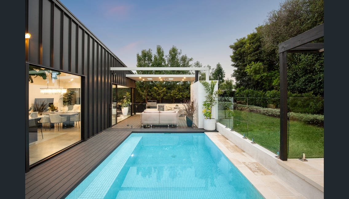 Solar-heated pool beside the living wing, Highett renovation