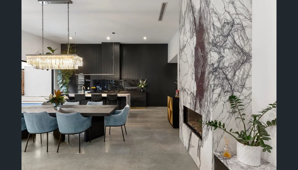Dining area with marble-clad fireplace, Highett renovation
