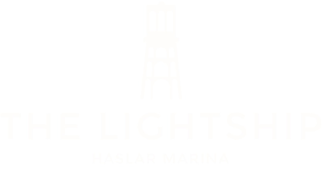 Logo for The Lightship Haslar Marina featuring a lighthouse illustration above the text.