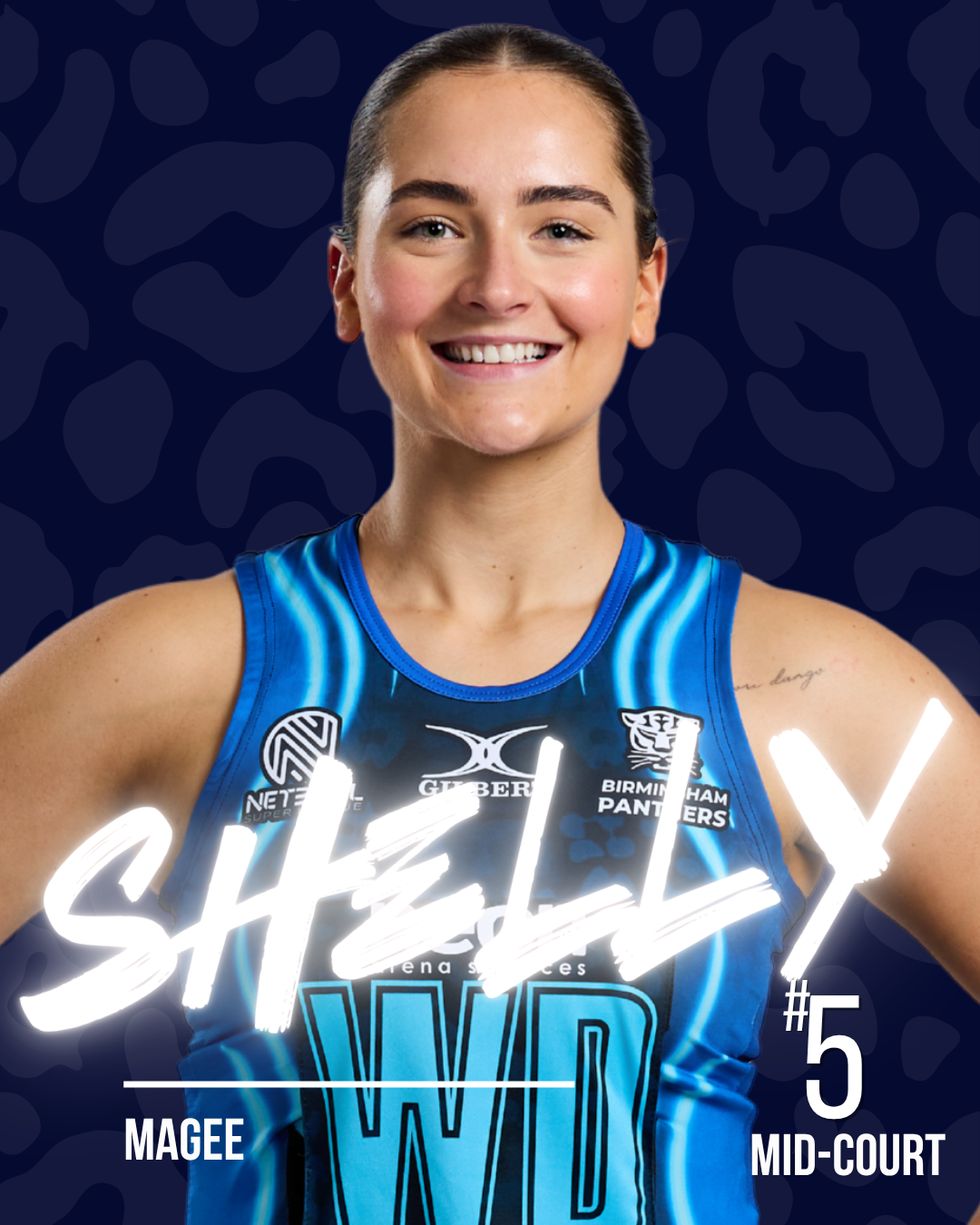 A female volleyball player smiling, wearing a blue jersey with sponsor logos, with text overlay reading Sheldon, #5, Magee, Mid-Court, with a dark patterned background.