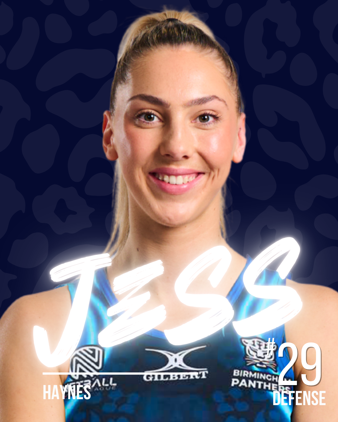 A netball player with blond hair smiling, wearing a blue netball dress, standing against a dark patterned background. Text overlay reads 'JESS', '#29', 'HAYNES', 'DEFENSE'.
