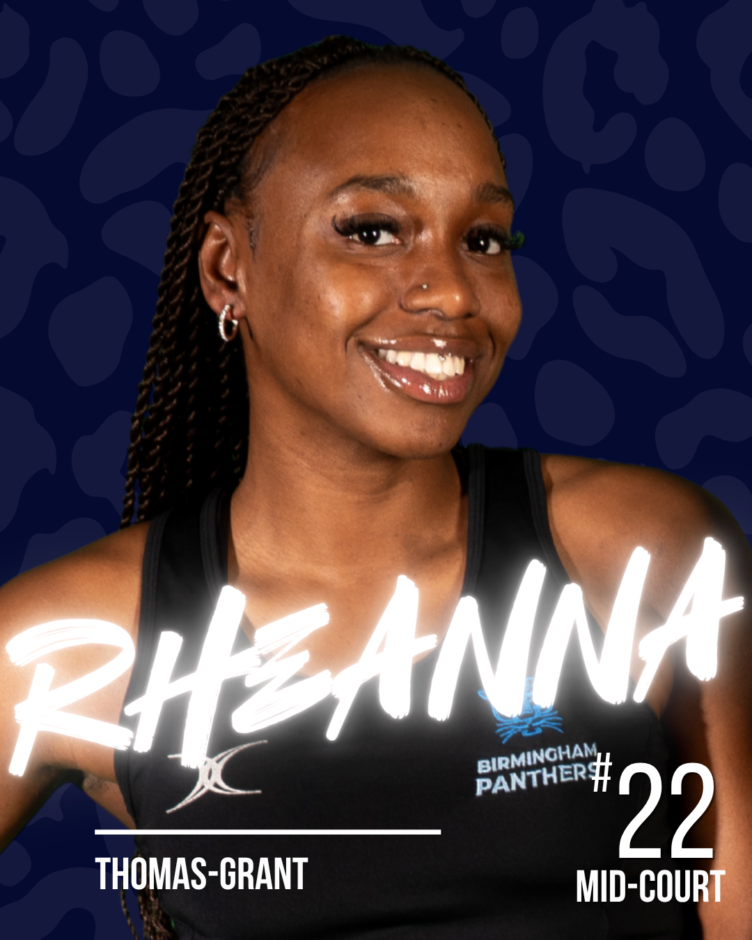 A netball player with the name Rheanna in white neon writing, on a dark patterned background.