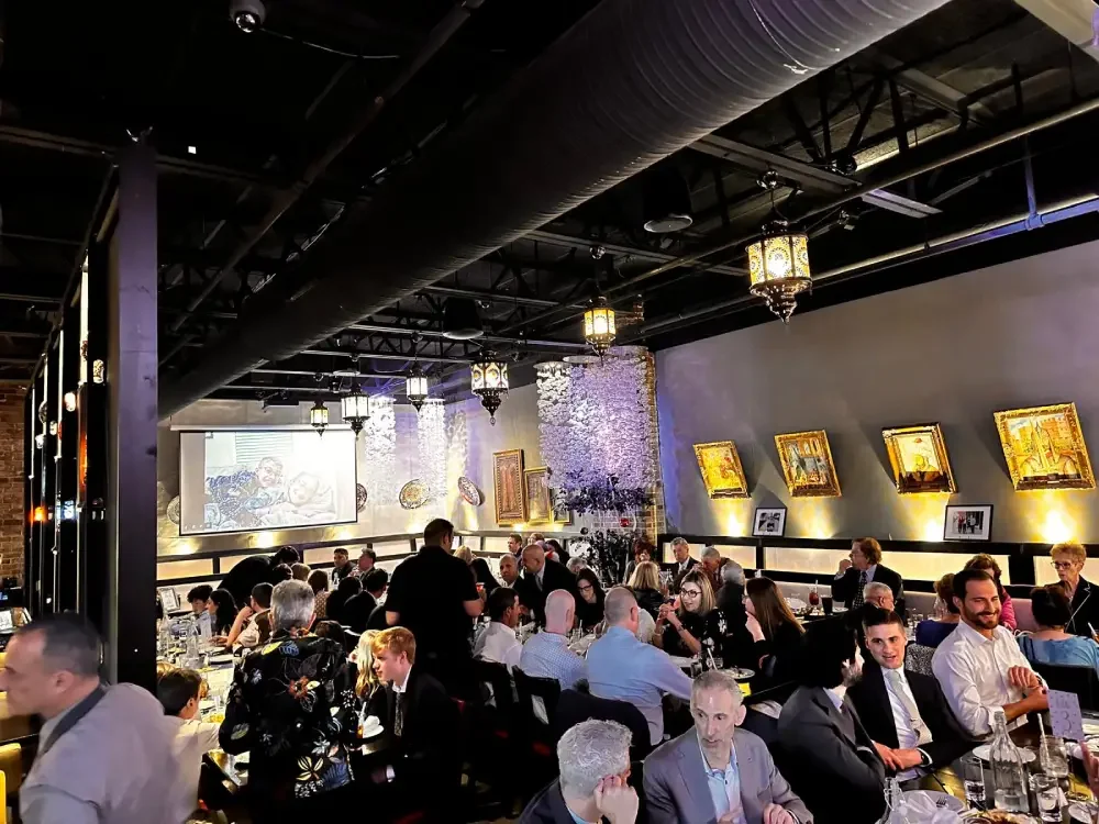 Guests gathered for a group dining event at Cazbar.