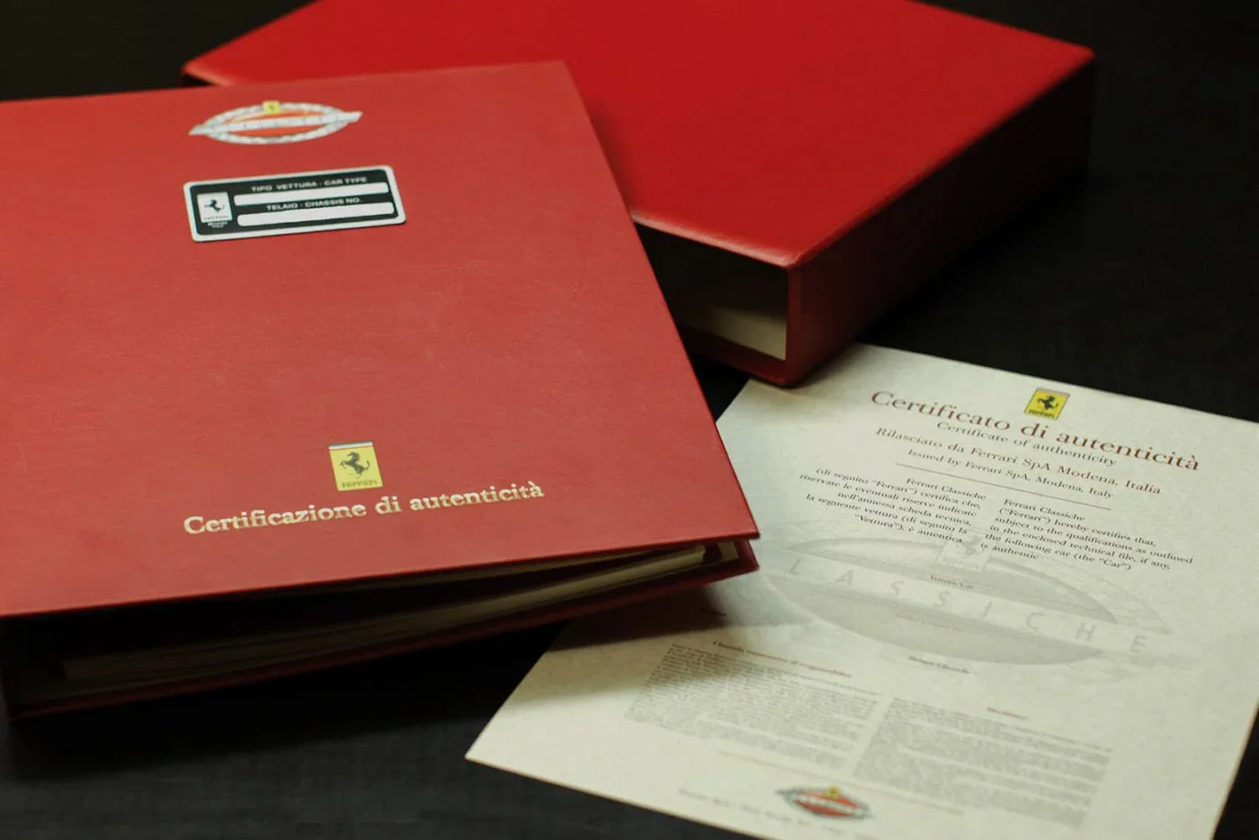 A red coloured service book for ferrari