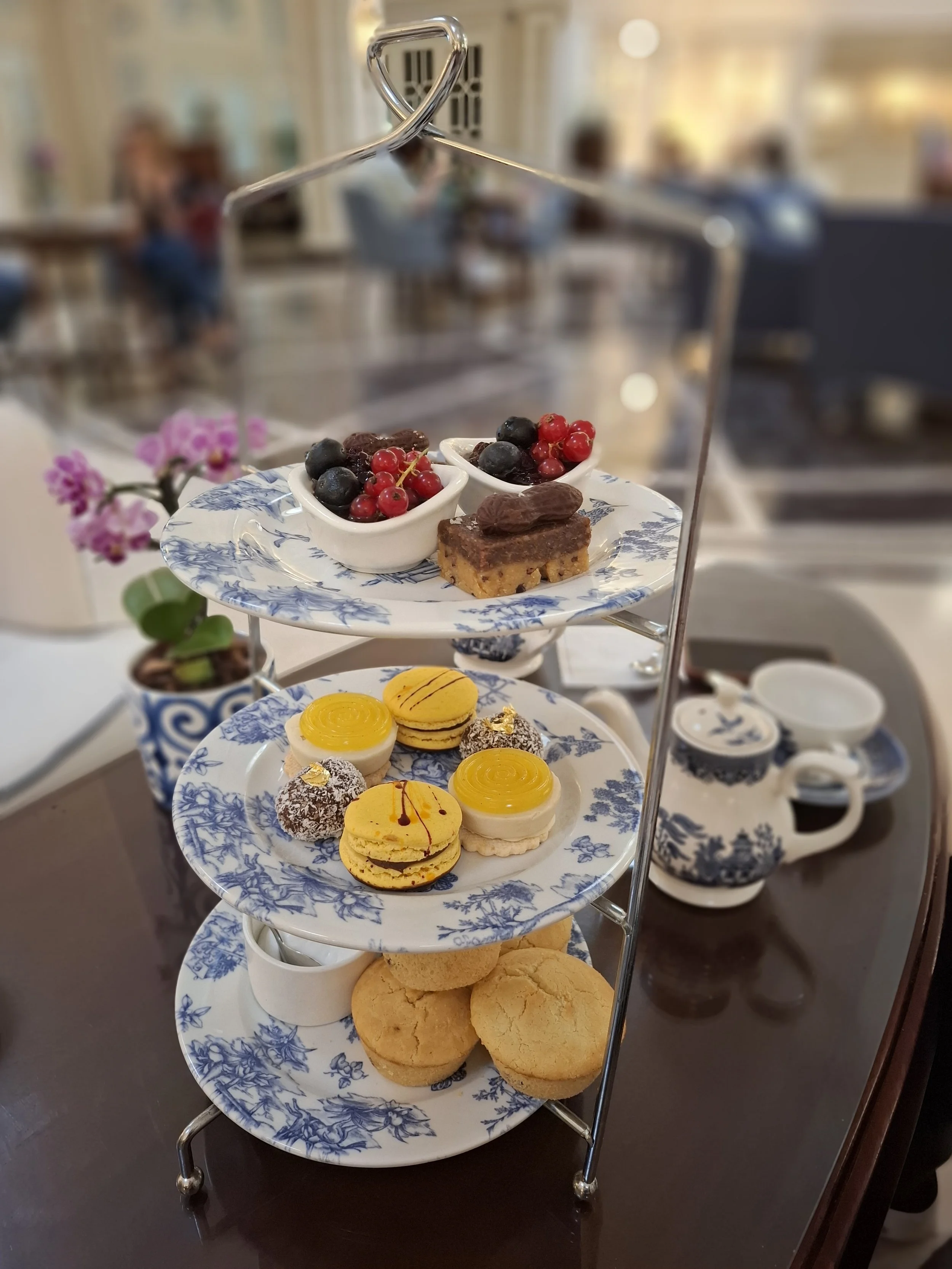 Cake stand full of small vegan desserts