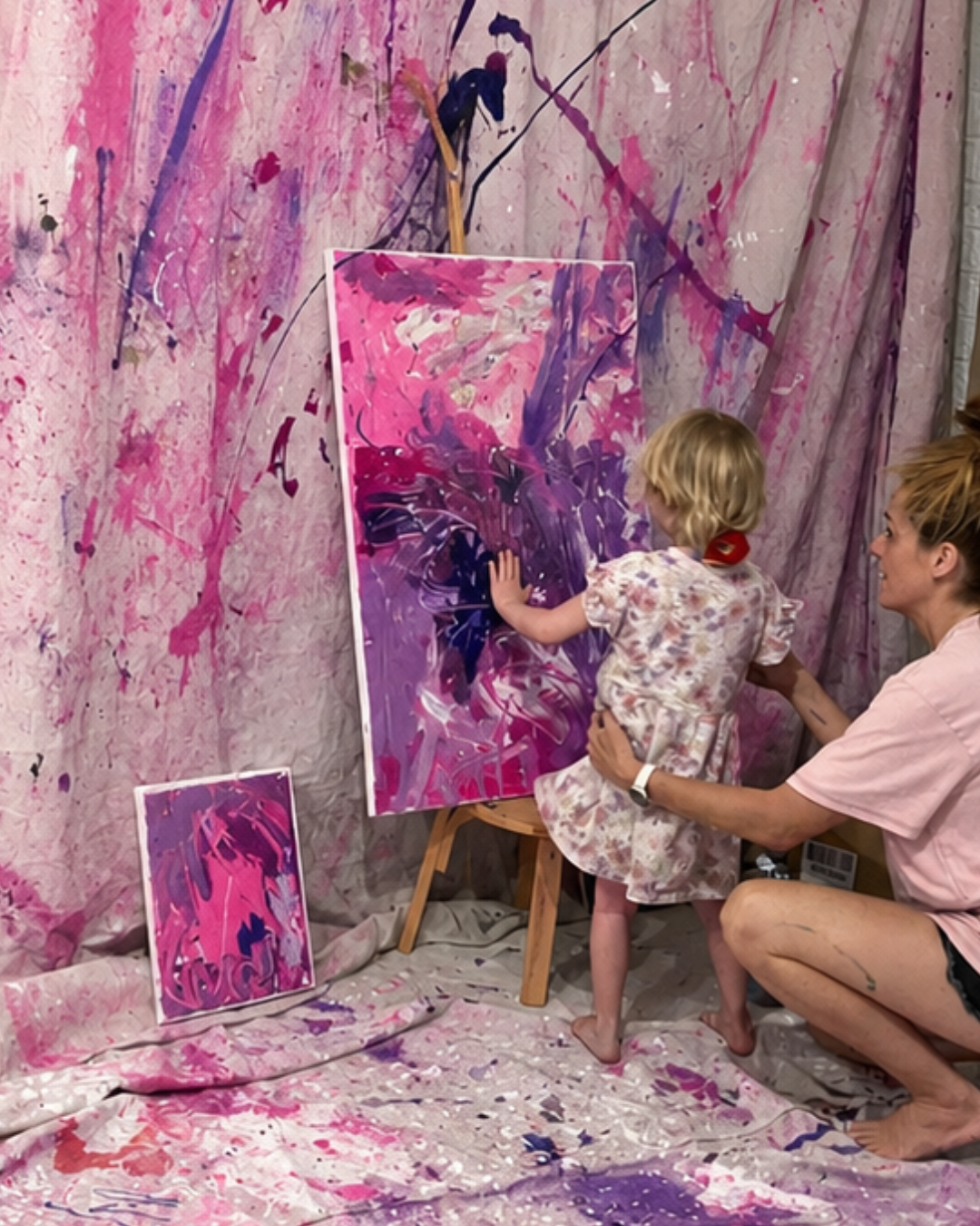 Mum and daughter painting together