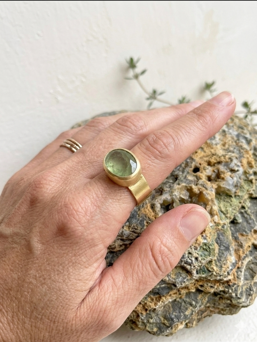 The stillness ring Green Tourmaline על יד.png