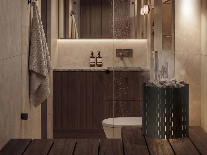 Combined sauna and shower room with a stone heater and warm timber finishes.