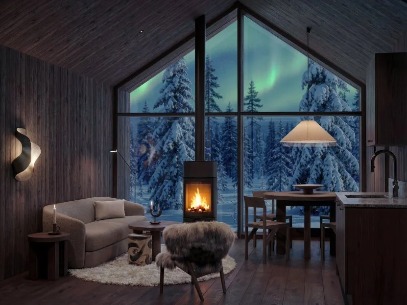 Evening living room view with a glowing fireplace and northern lights outside.