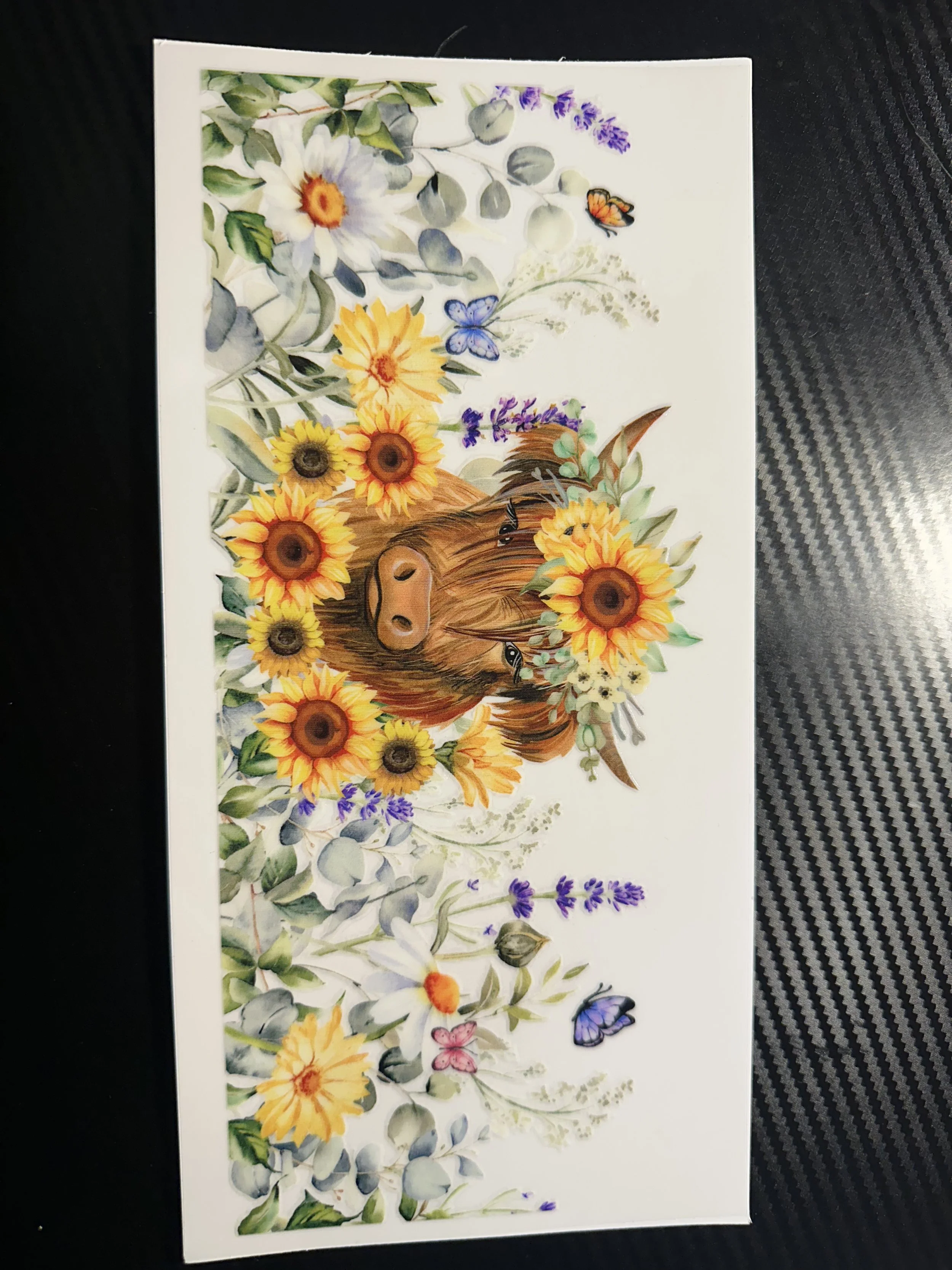 Cow with sunflowers