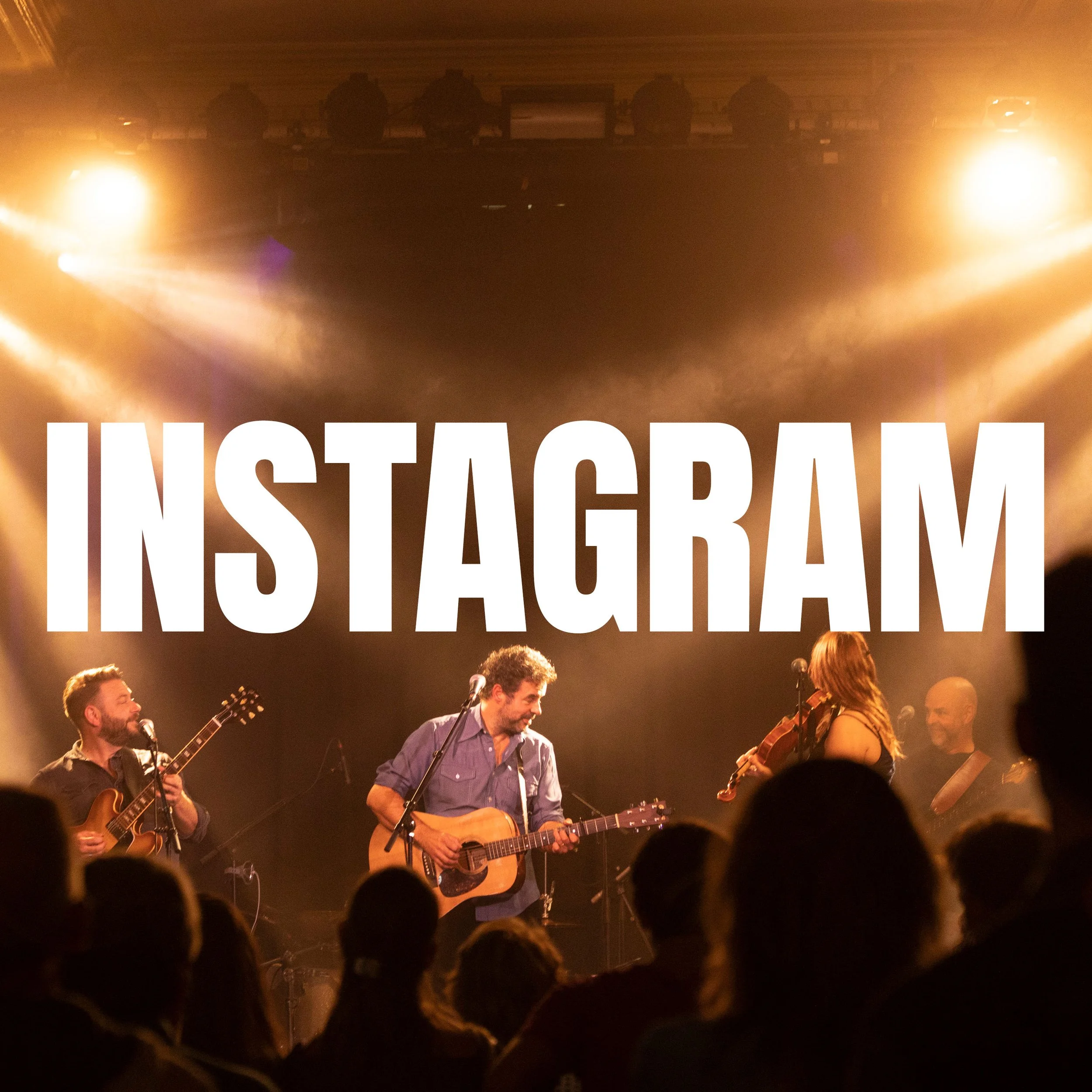 A live musical performance by the Dieter van der Westen Band on stage, with large illuminated text reading 'INSTAGRAM' behind them and an audience in the foreground.