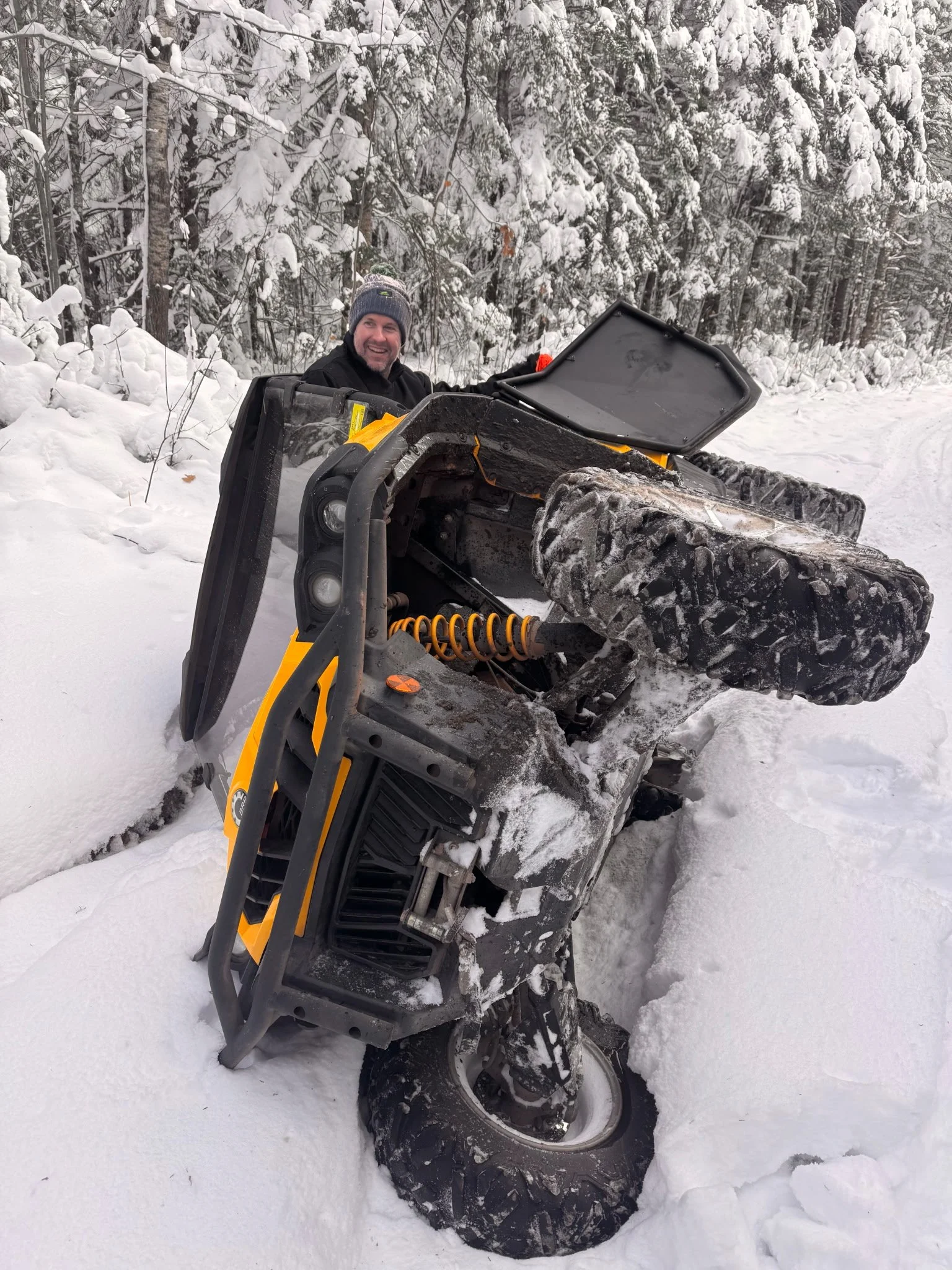 Tipped ATV while brushing the trails