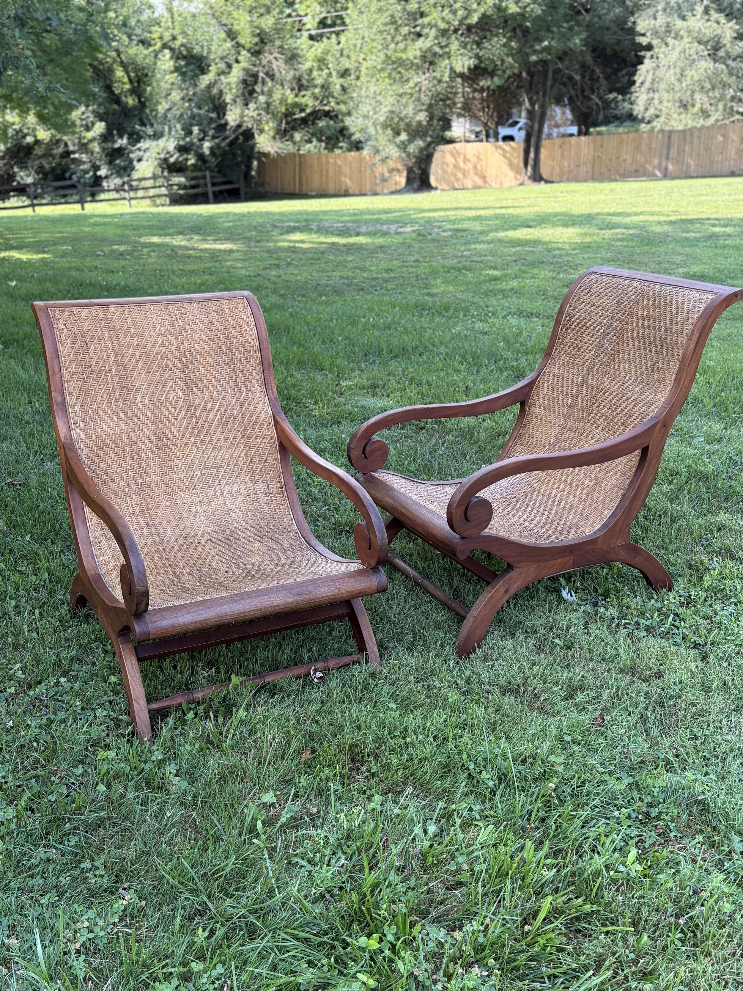 British Colonial Loungers, teak and wicker, Indonesia, mid-20th century.
