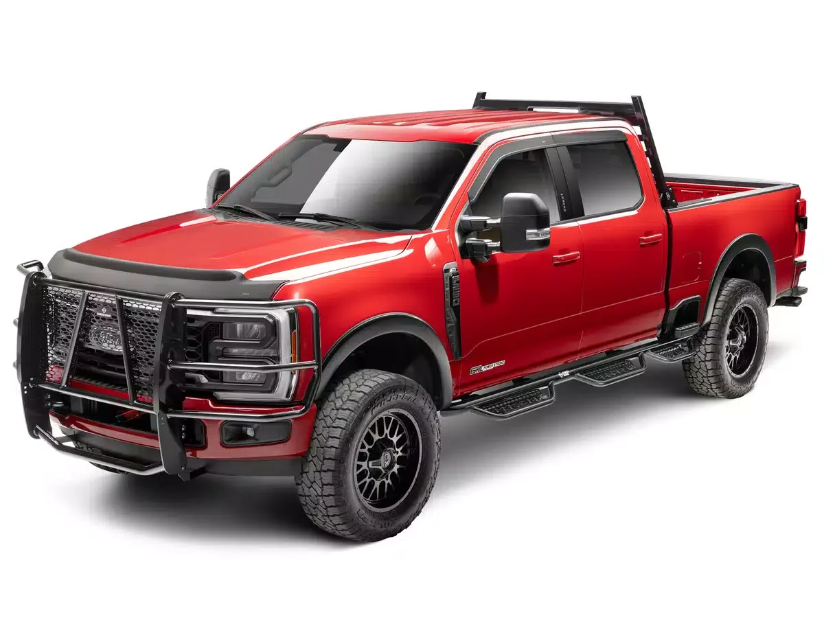 Red pickup truck with off-road tires, black grille guard, and side steps on a white background.