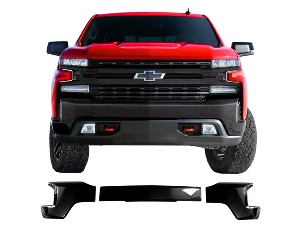 Red Chevrolet pickup truck with black front grille and side mirrors, tire treads visible, inset of black front splitter below the vehicle.