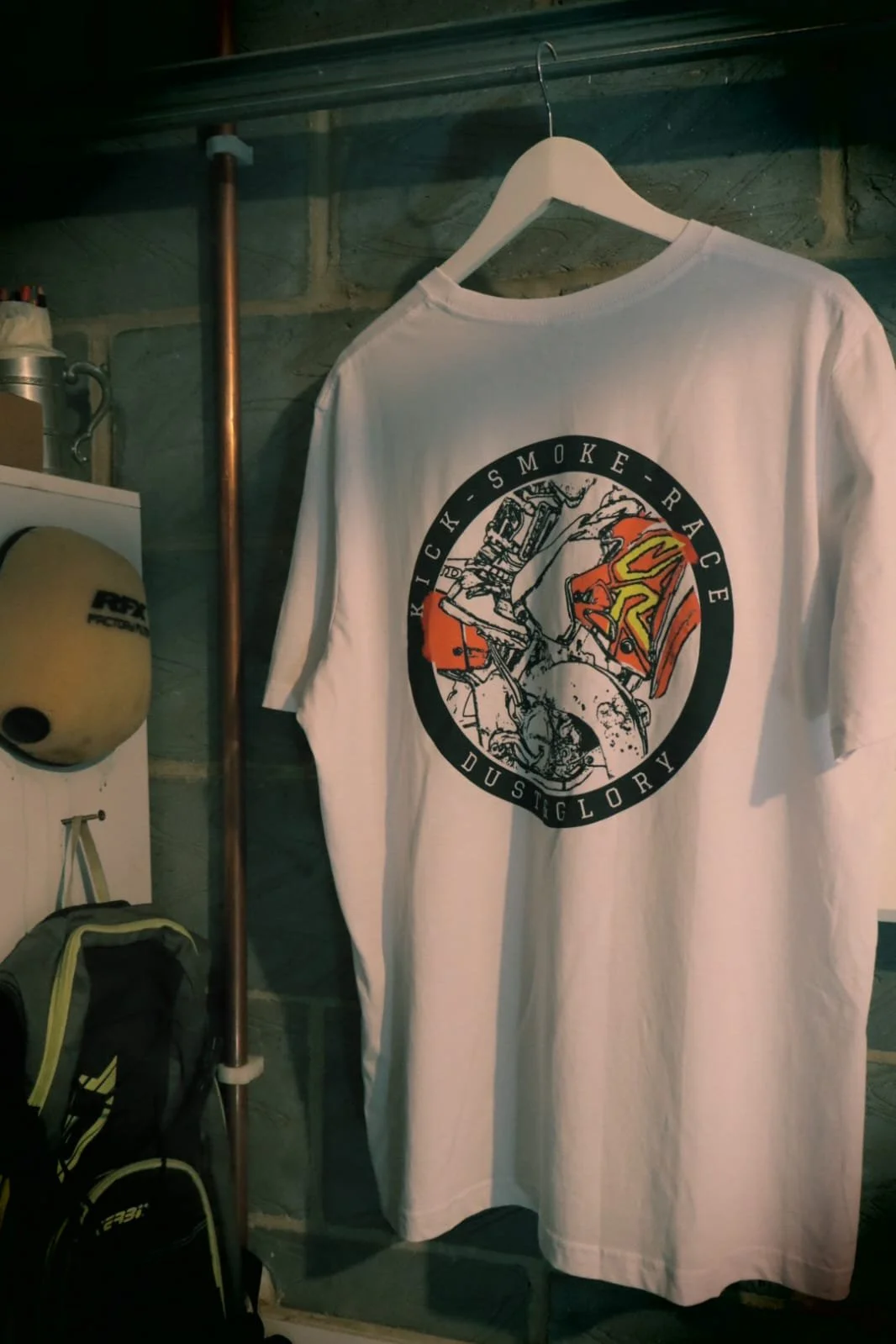 Kick Smoke Race t shirt hanging in garage. Honda CR 2 stroke motocross bike