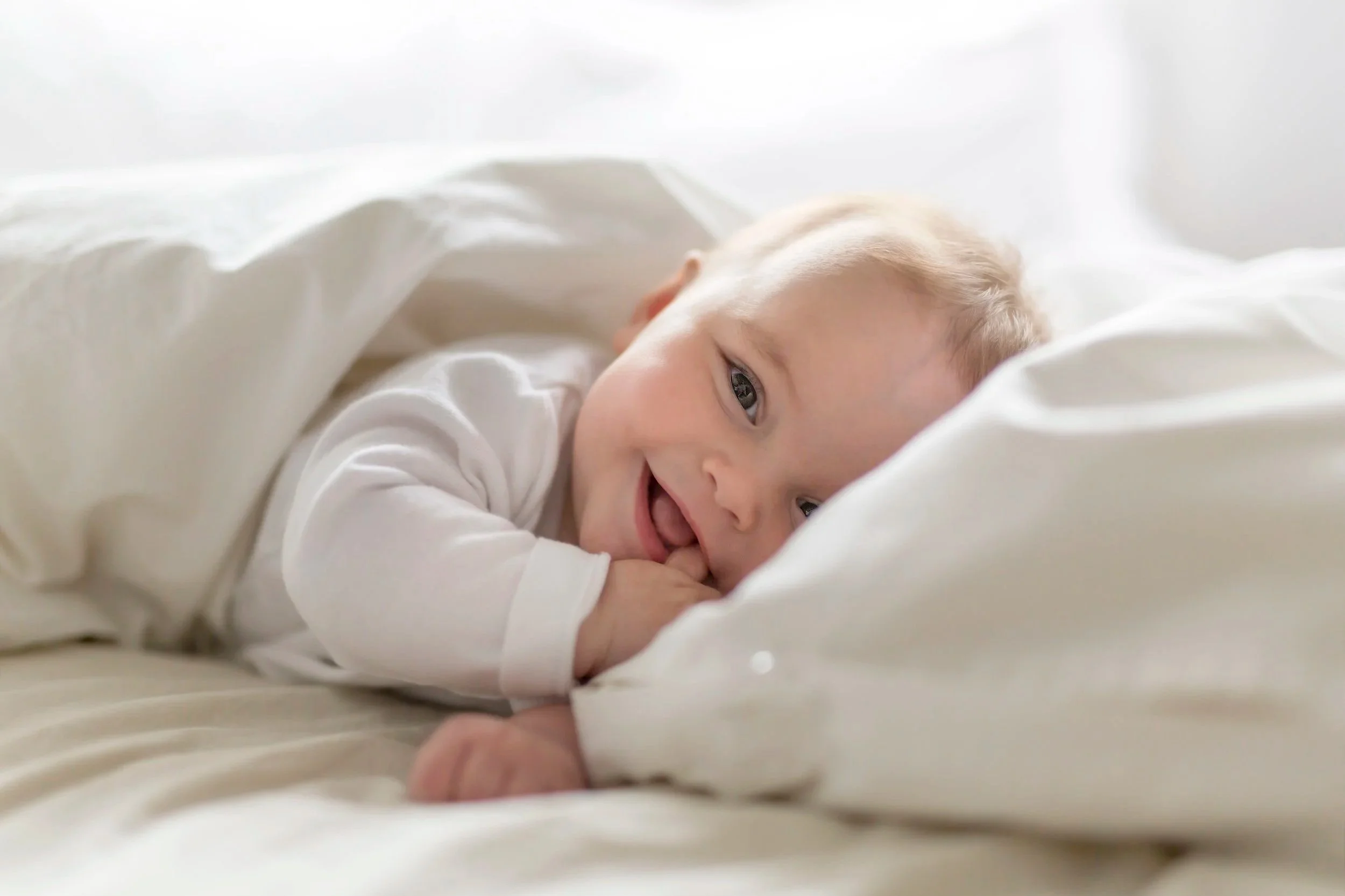 Smiling happy baby whose had enough sleep, energy baby