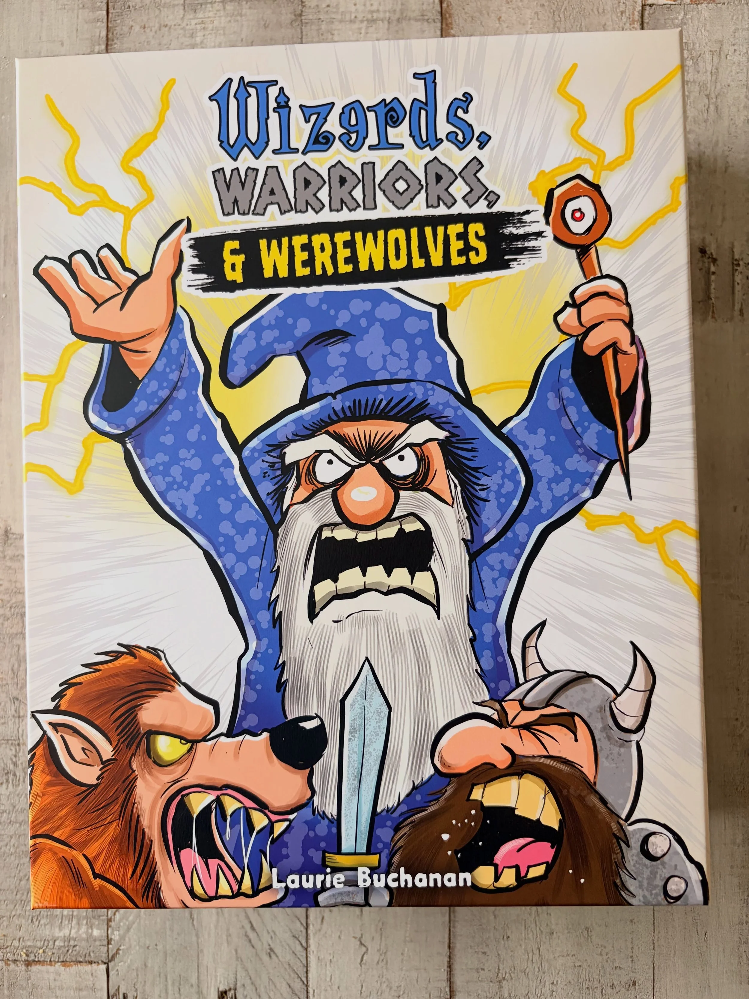 Look folks! It&rsquo;s a new game! I&rsquo;m really happy with how this game came out. First off, it&rsquo;s HUGE! And the artwork looks great at this size. It should be out very soon if not already. Check out Wizerds, Warriors and Werewolves at your