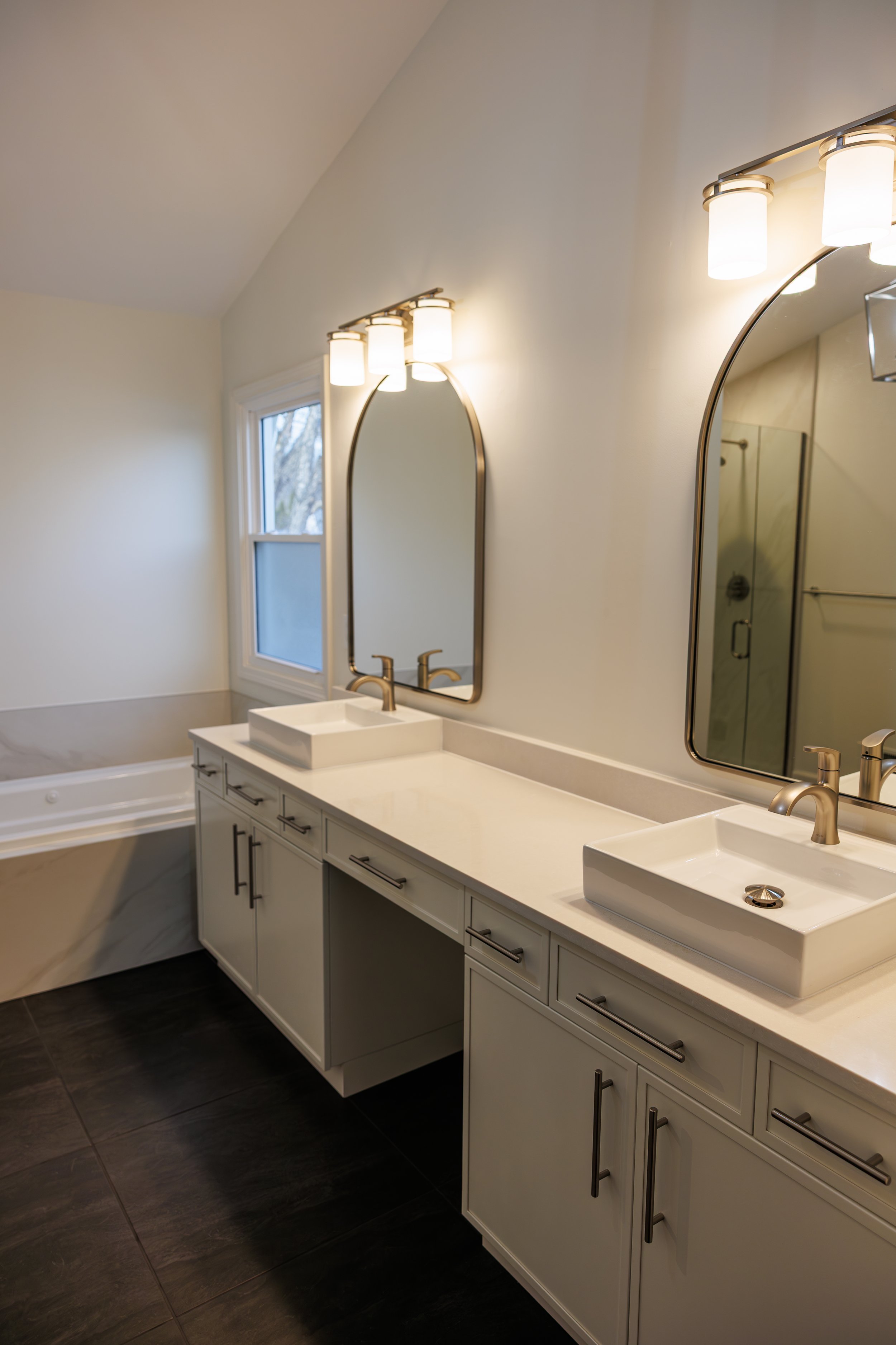 custom-home-remodeling-makeup-vanity-brass-fixtures.jpg