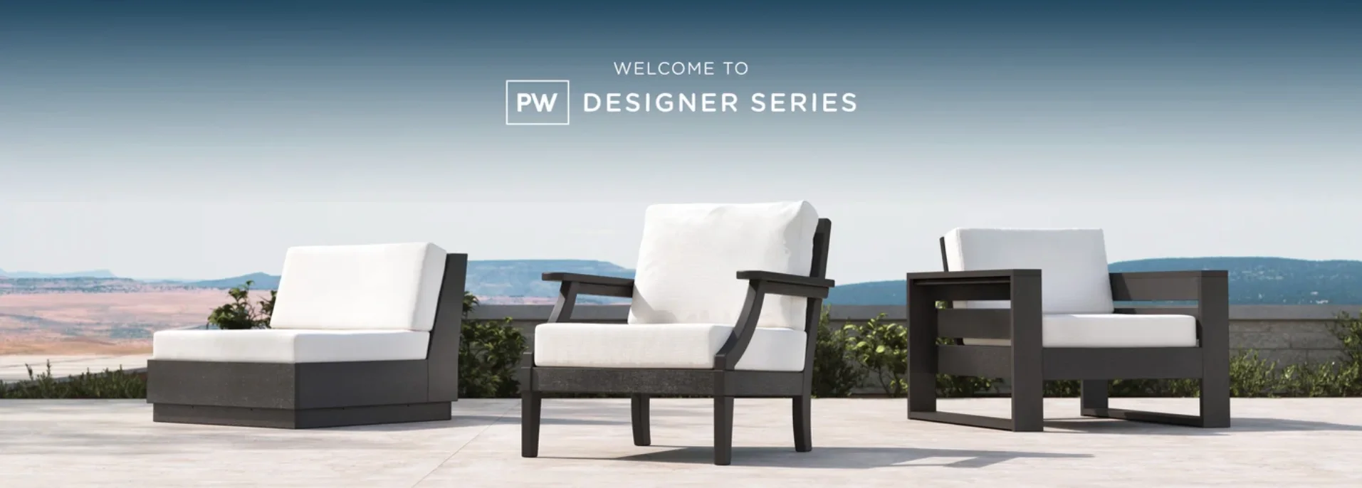 Outdoor patio with three modern black and white chairs against a scenic mountain landscape, displaying a welcome message for PW Designer Series.