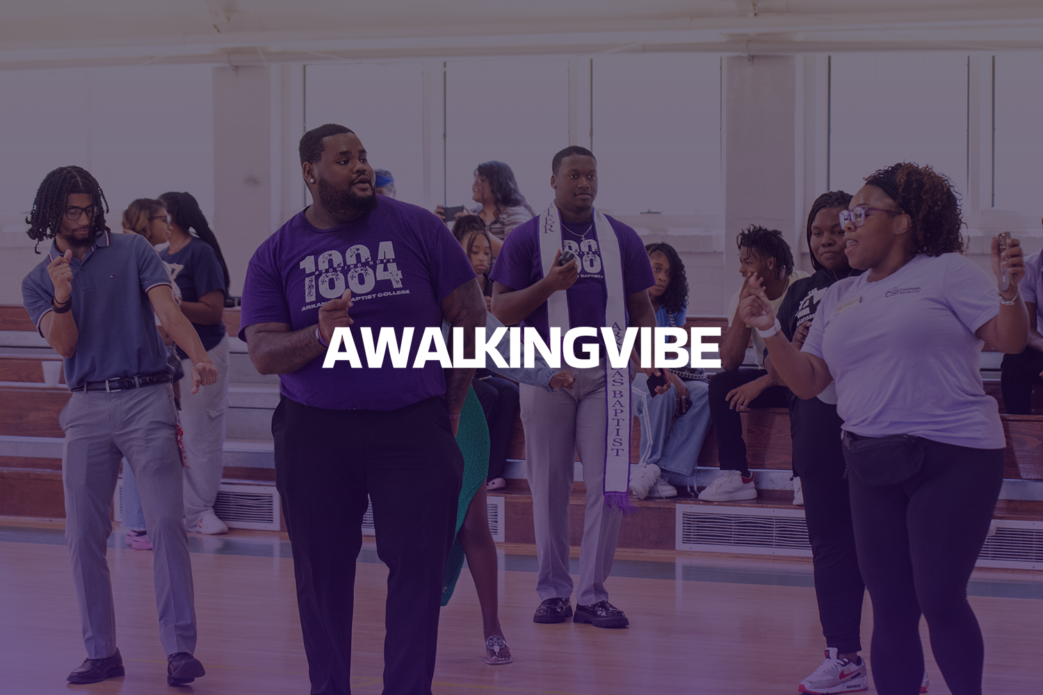 Group of diverse people dancing and singing in a church with wooden pews and large windows in the background, with the text 'AWALKINGVIBE' overlaid.
