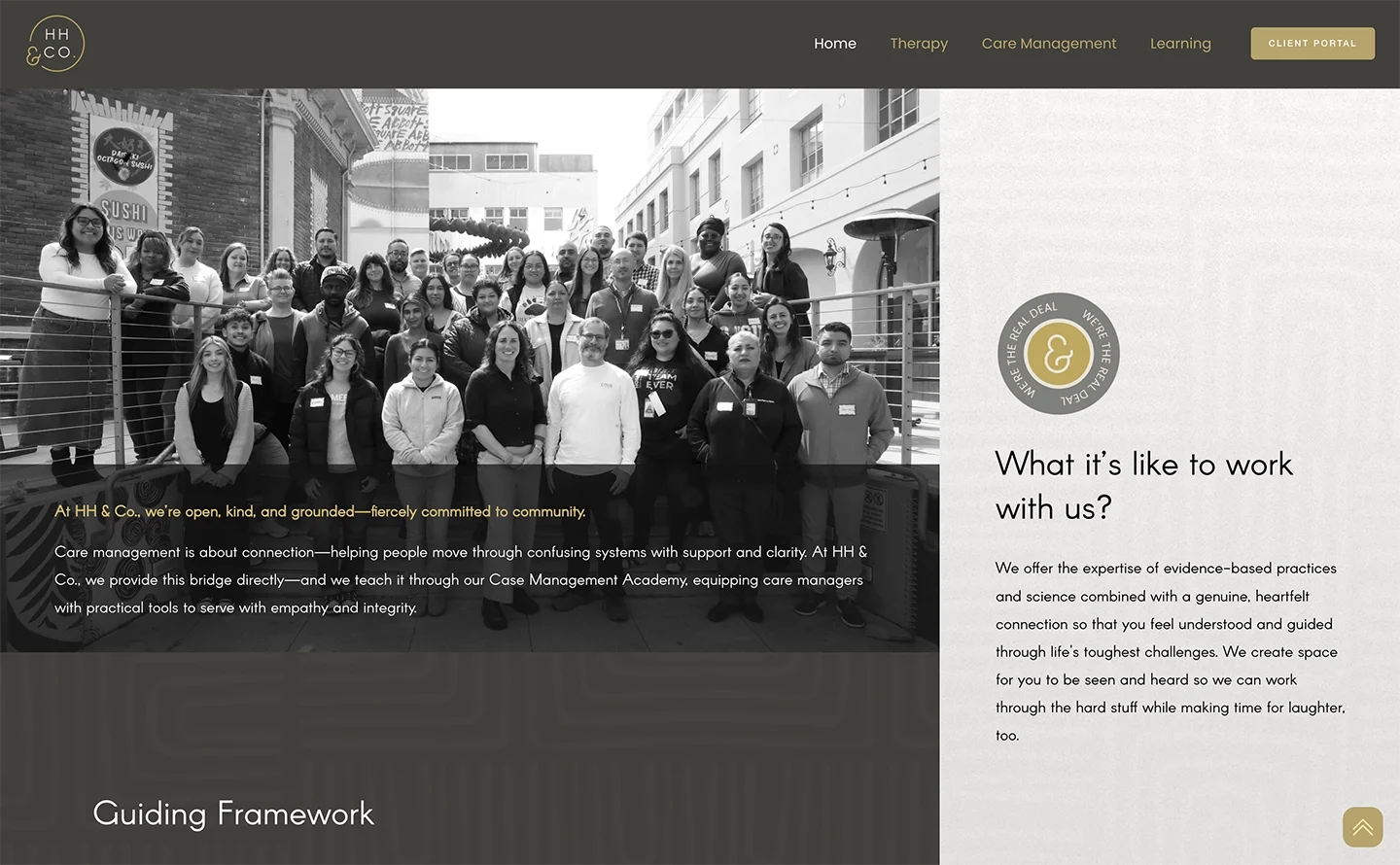 Group of diverse people gathered outdoors, some wearing name tags, standing on a metal railing. They are in front of a building with signs, one indicating sushi. The photo is in black and white, with a yellow accent in the webpage design.