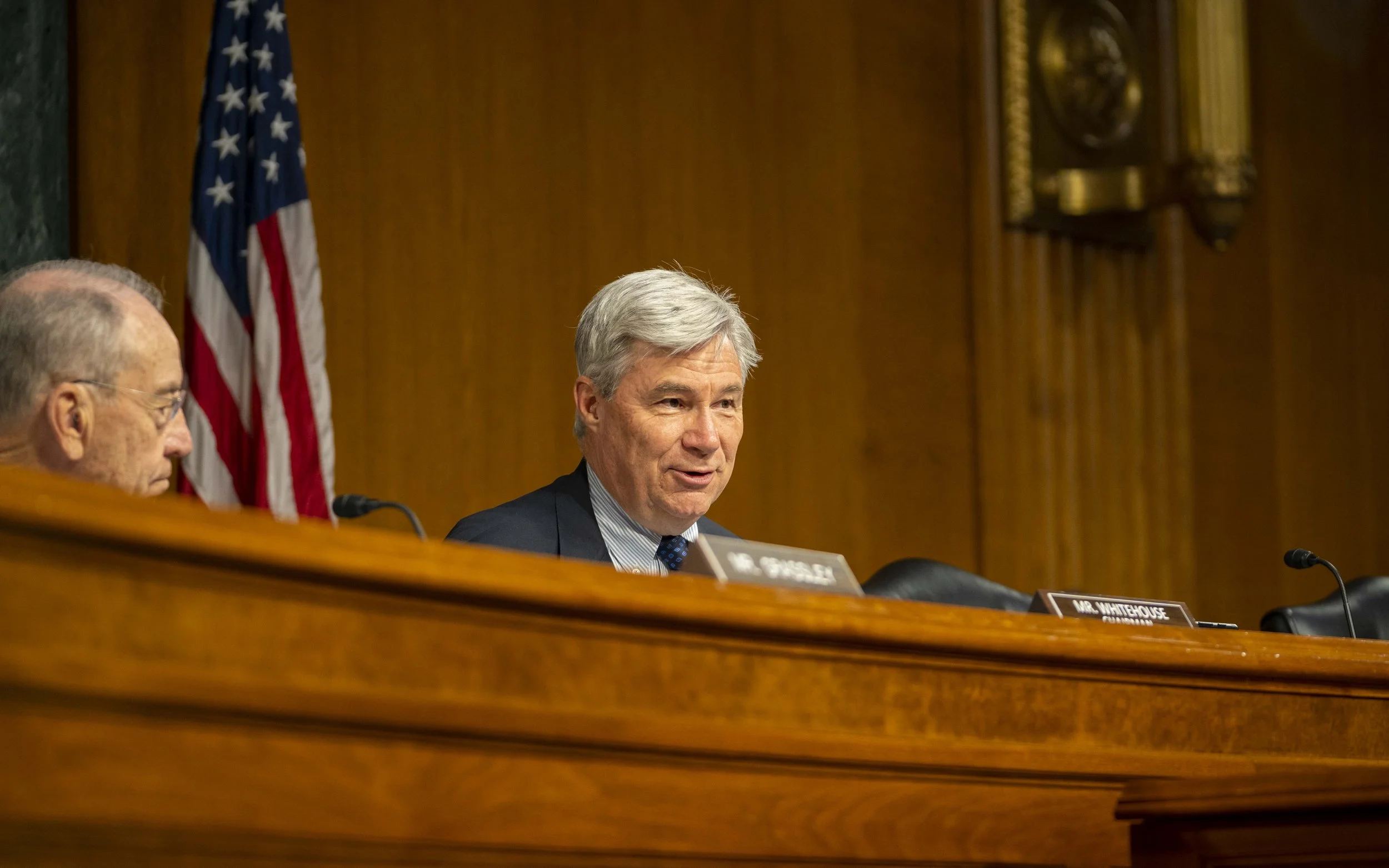 Sen. Sheldon Whitehouse speaks at committee hearing.