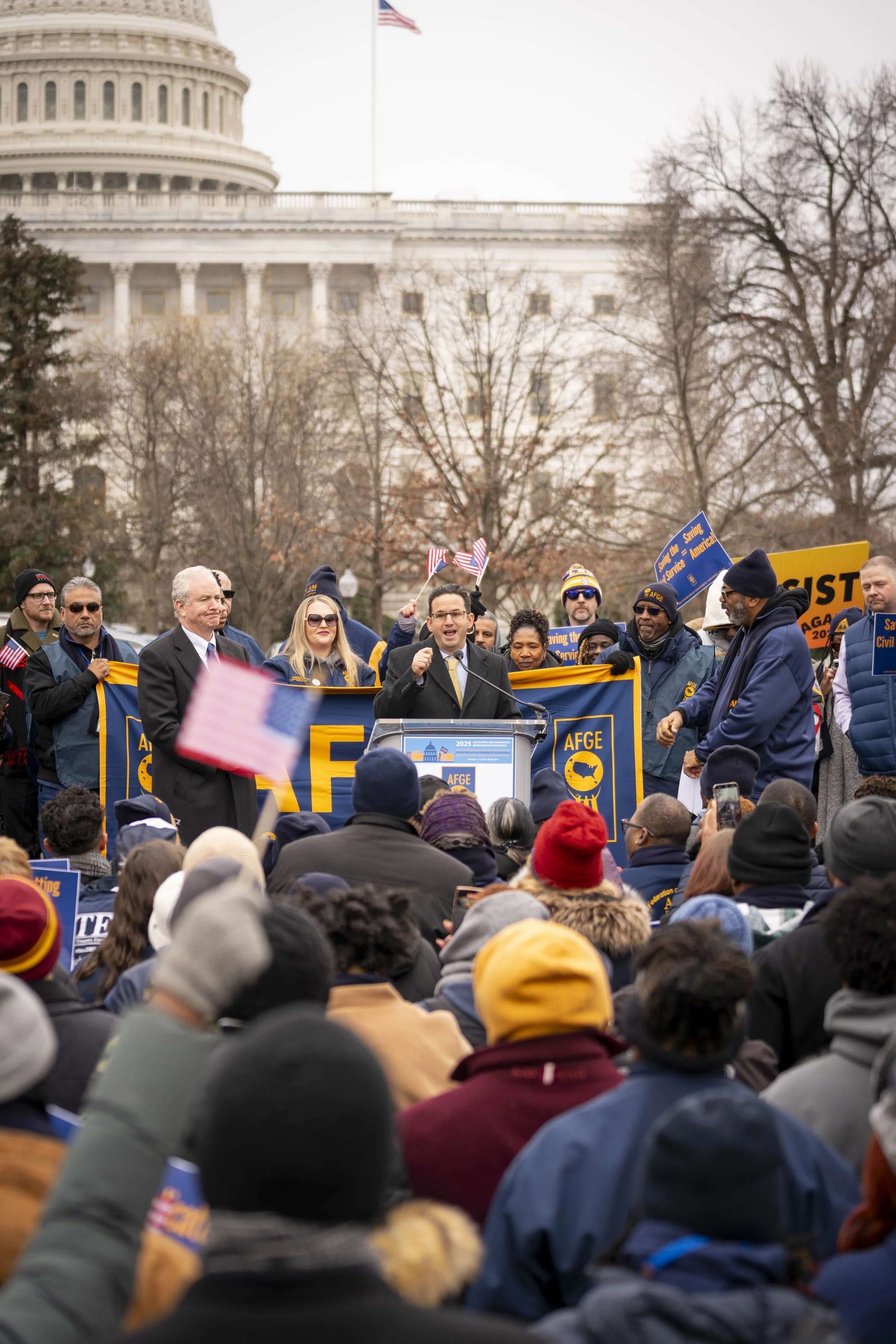 Senator Brian Schatz addresses a crowd at rally in front of the US Capitol.