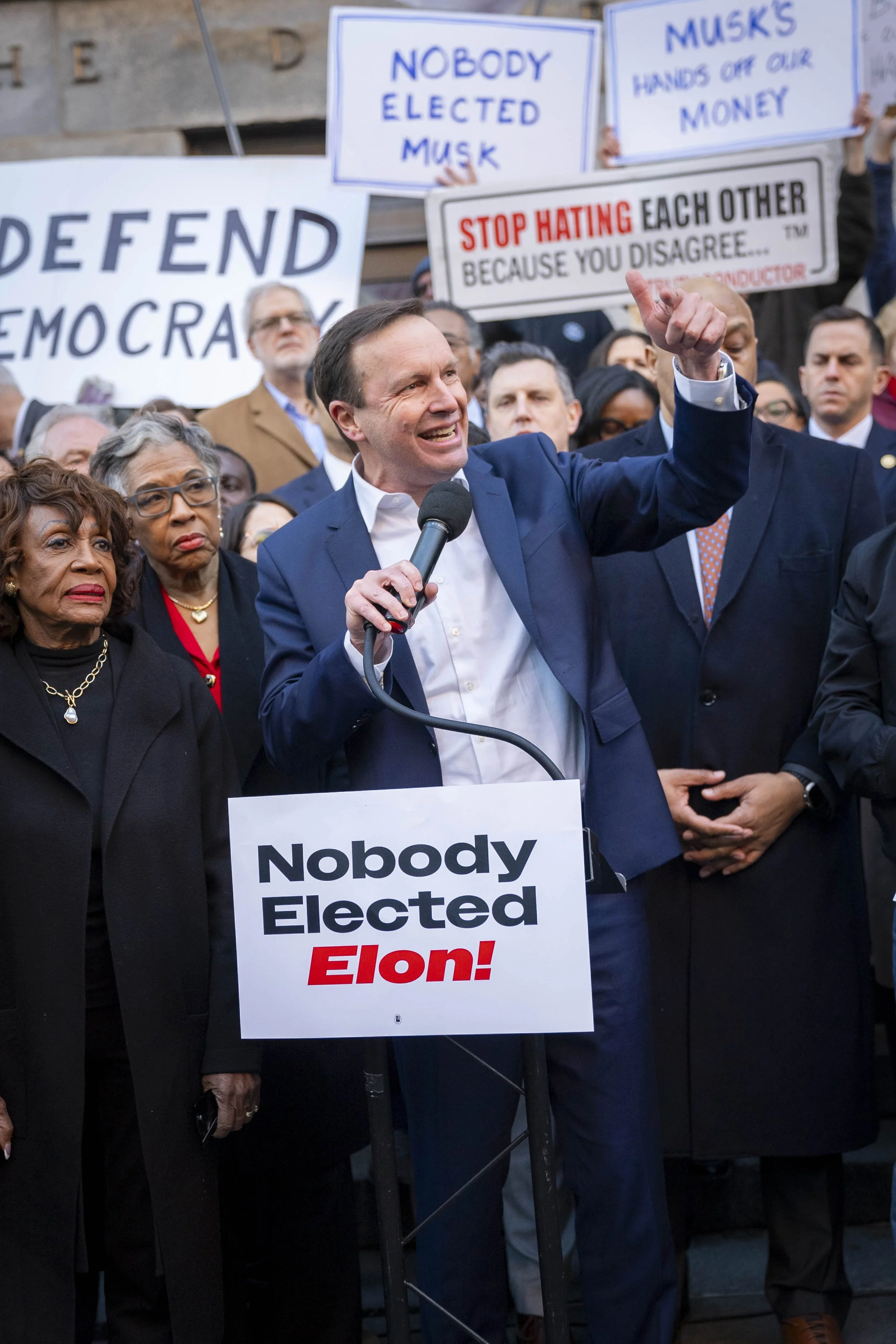 Senator Chris Murphy speaks at rally in front of the CFPB in protest of Elon Musk's DOGE takeover.