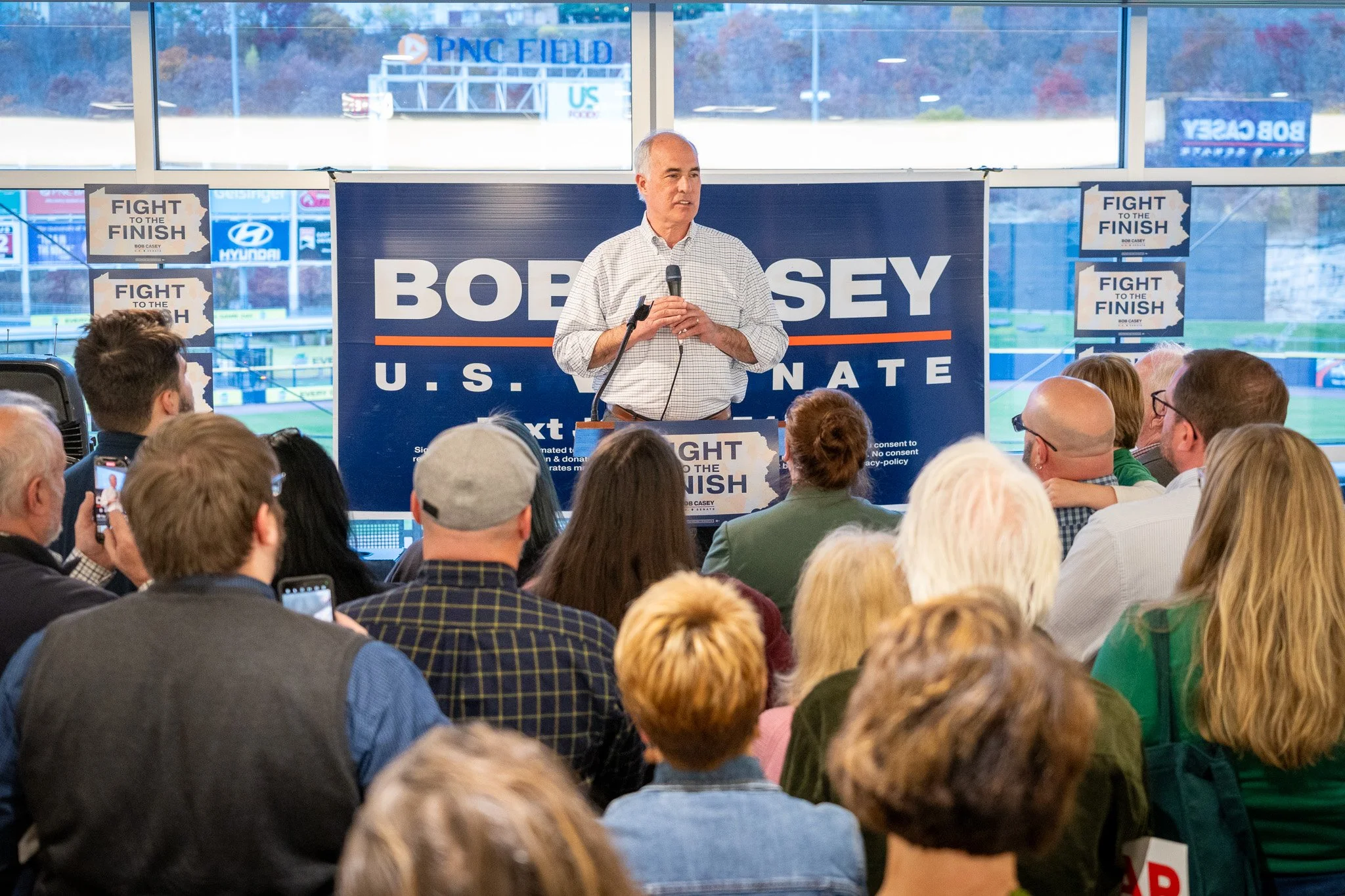 Senator Bob Casey speaks to a crowd at a campaign event.