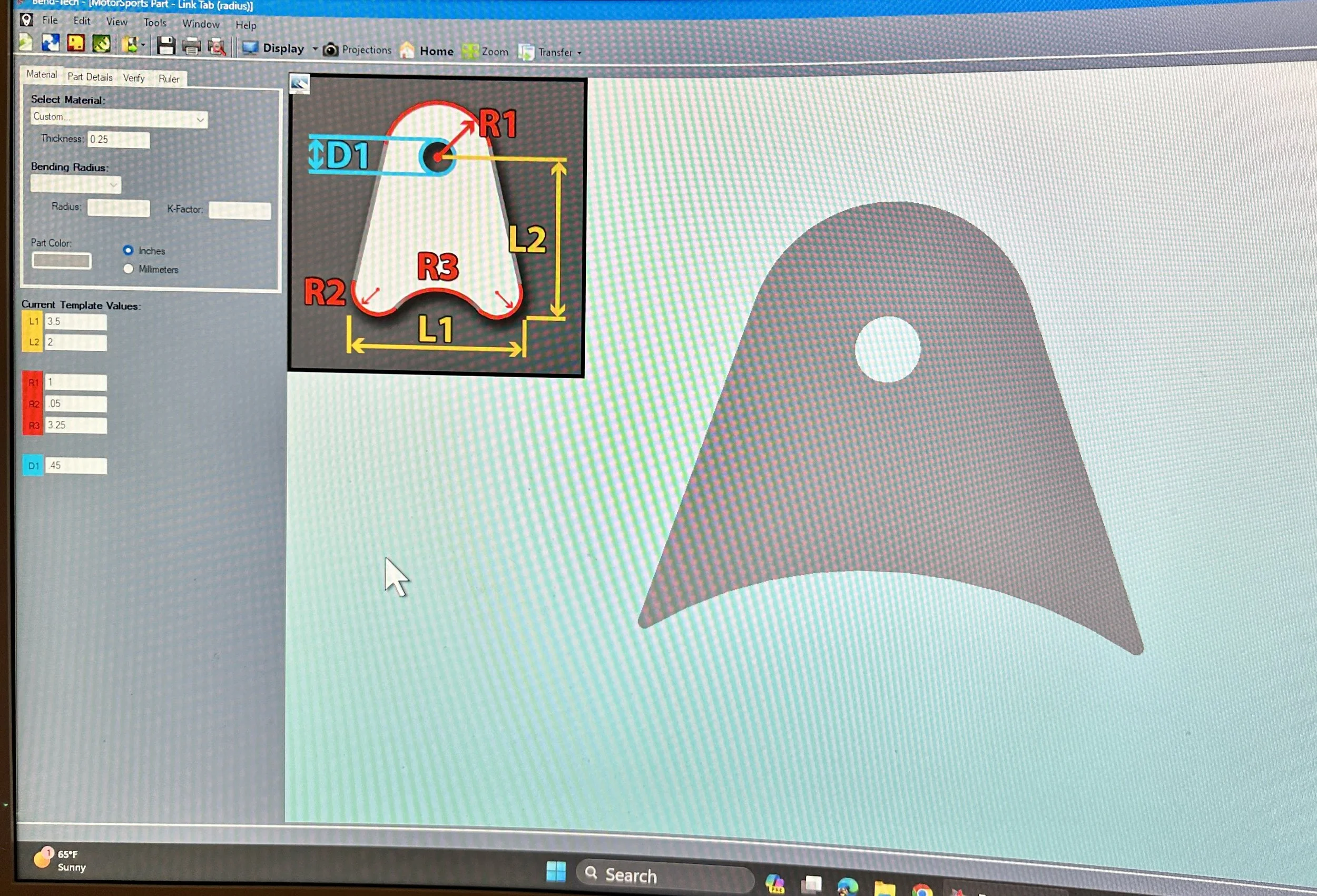 Computer screen displaying software for designing a bend tech part, showing dimensions and radius measurements of a metal component.