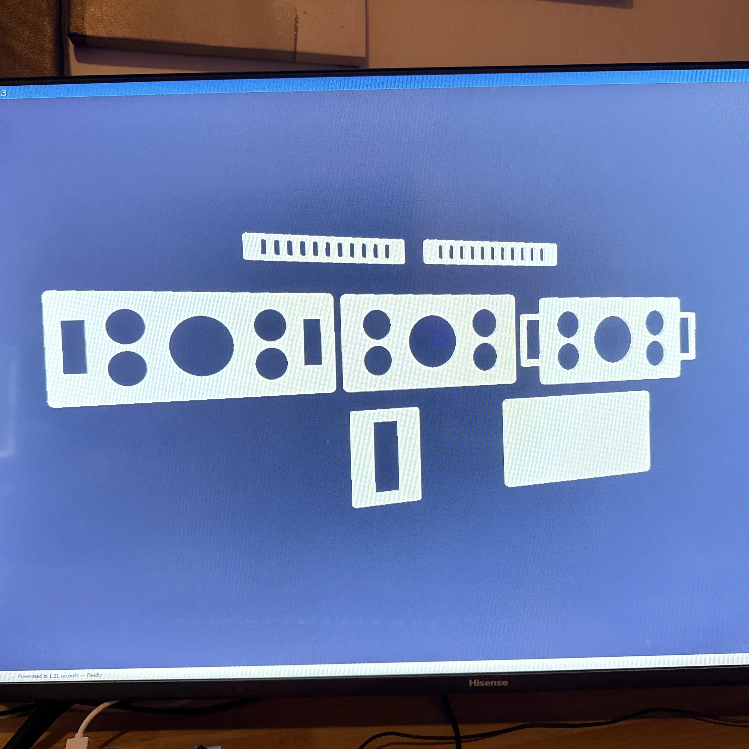 Computer monitor displaying a blue screen with test patterns and color bars, with some text and graphical elements partially visible.