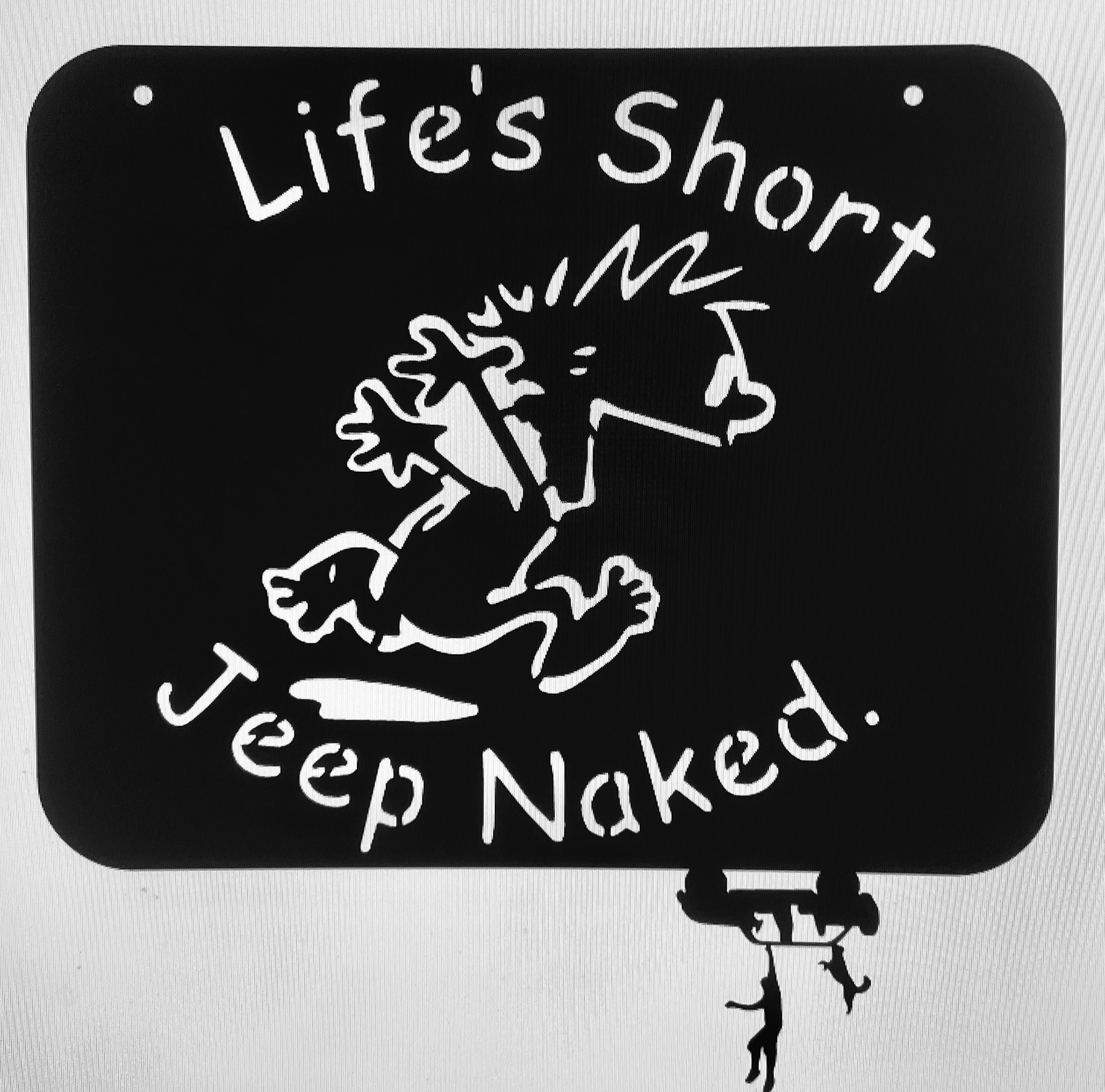 A black and white sign with the words 'Lifted Short' written in a stylized font, with additional text below that is not fully visible.
