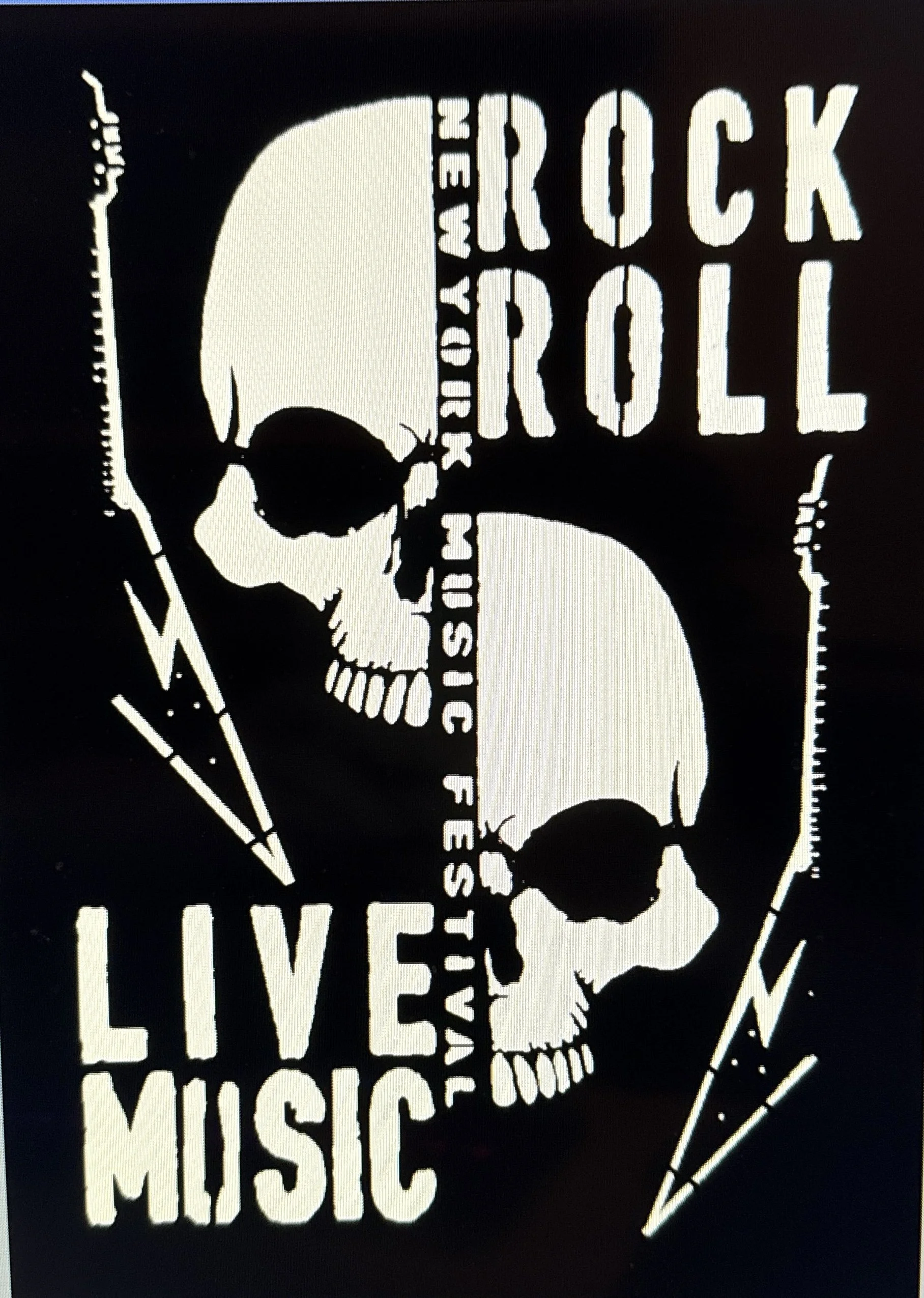 A black and white illustration of a human skull surrounded by various design elements, with the words 'Rock Your Soul' and 'Live Music' included in the design.