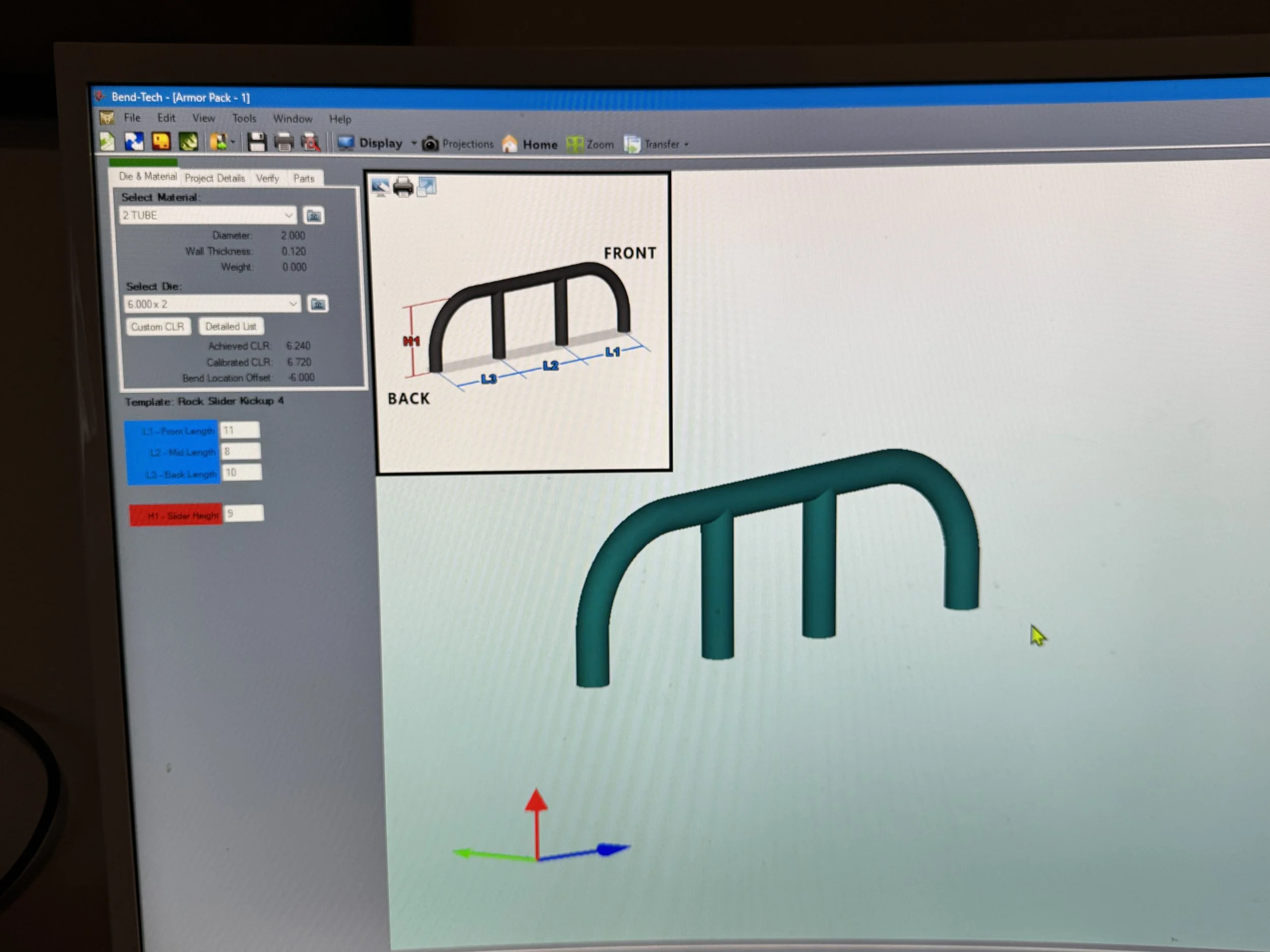 Computer screen displaying 3D modeling software with a diagram of a bent tube, showing front and back views, and color-coded axes.