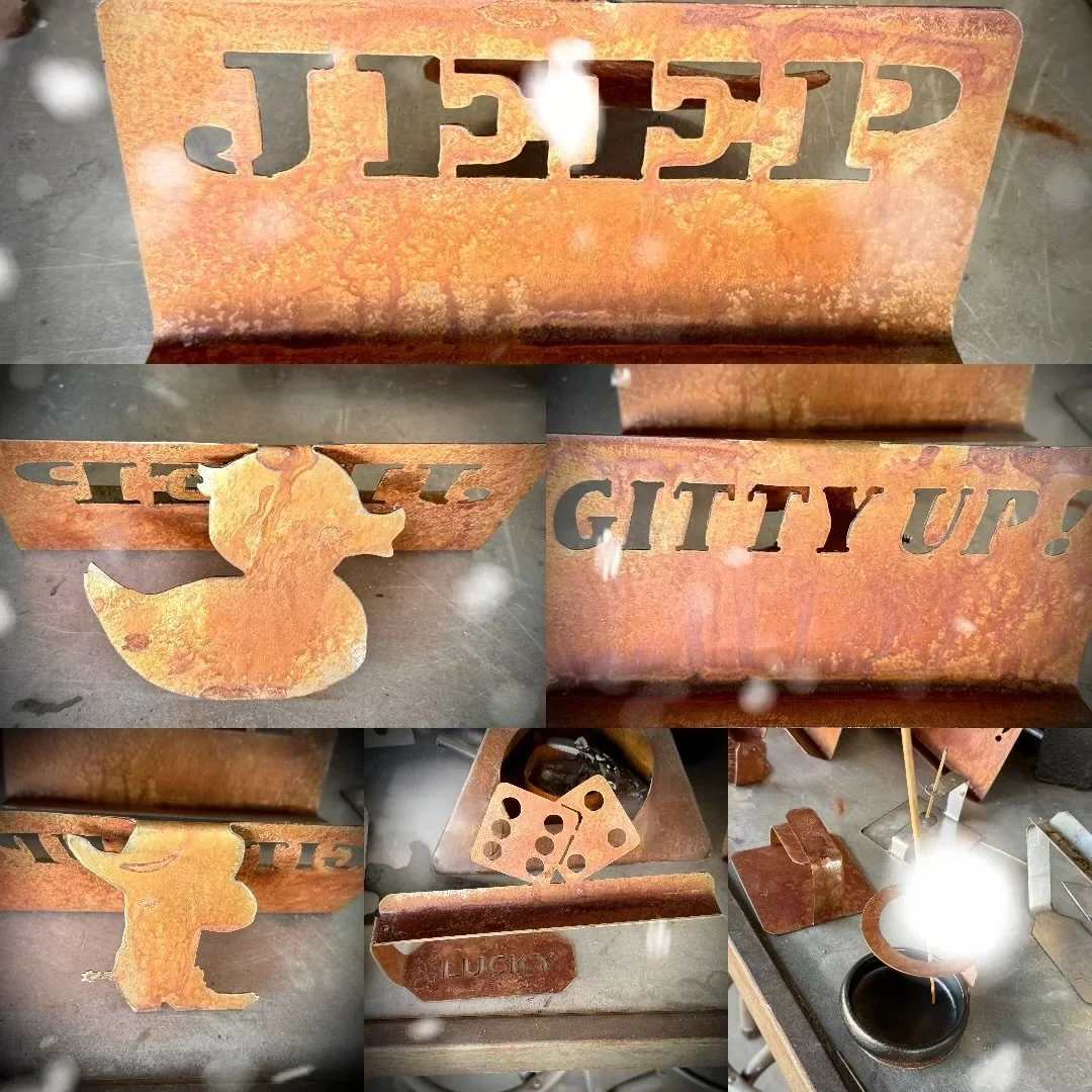 A rusty metal sign with cut-out letters spelling 'FEEL' and 'GITTY UP!', a duck silhouette, a metal dice, a small container with a "LUCKY" label, and a kitchen scene with a round cutting board, a pot with a spoon, and other kitchen utensils.