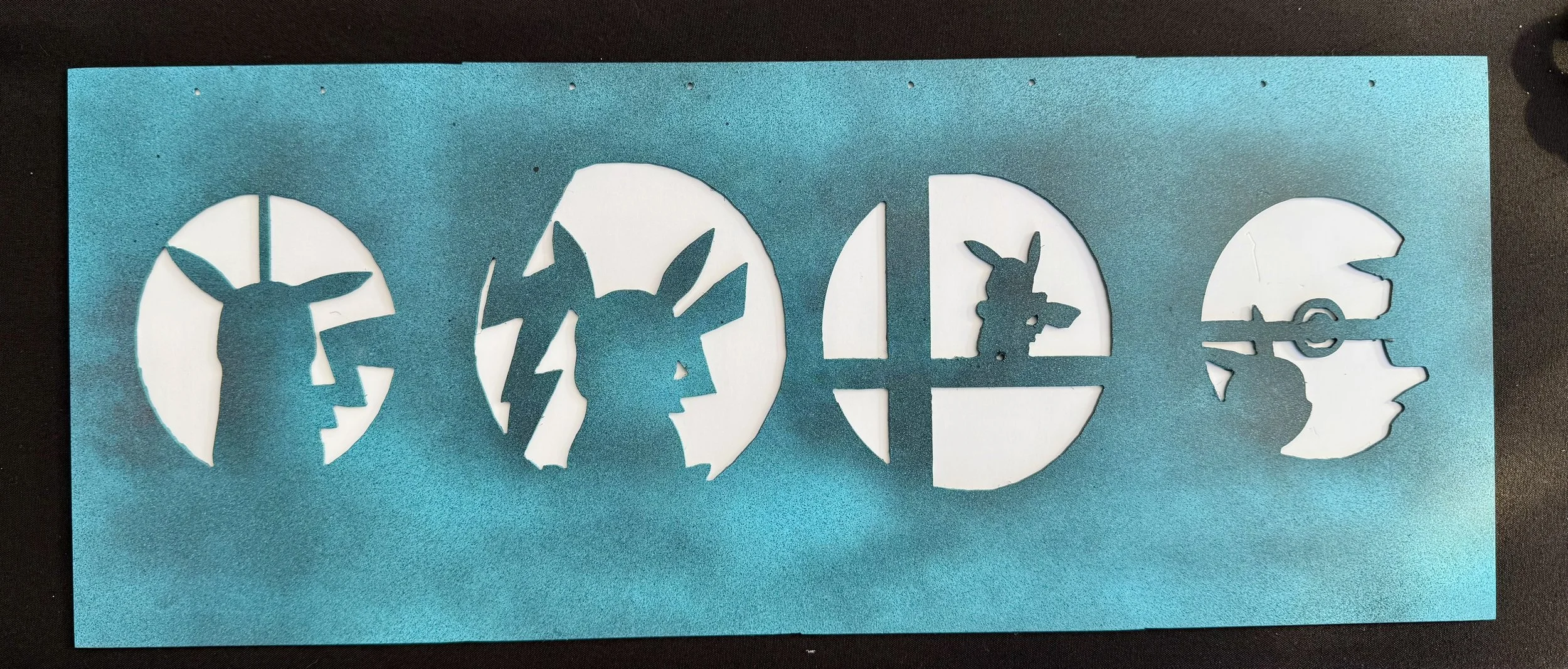 Stencil art featuring silhouettes of Buzz Lightyear, Gandalf, and Daenerys Targaryen, with the word 'LOVE' in the center.