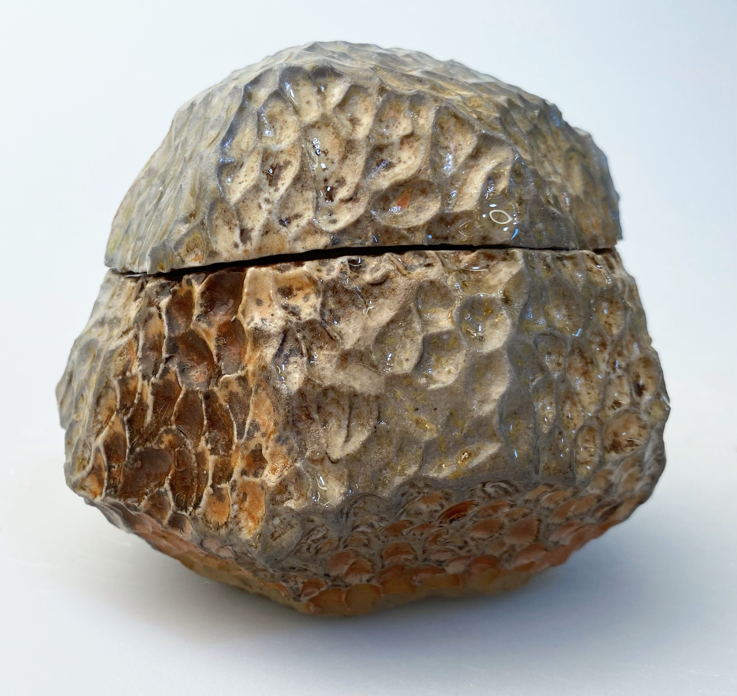 Stone, 3½" in height, △10 woodfire, tenmoku, 2025