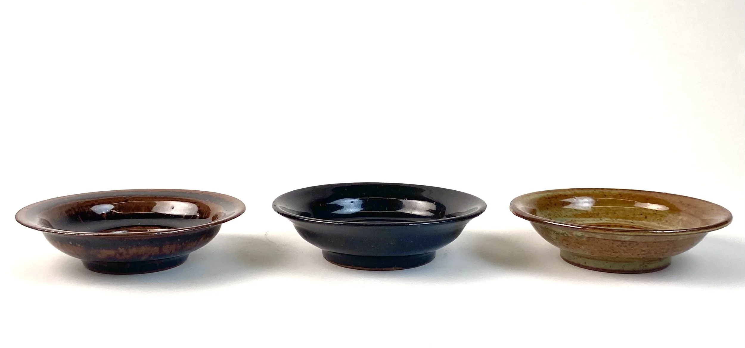 Series of Side Dishes (Copy), 5½" in width, recycled clay, △10 gas reduction, mirror black and tenmoku and woo blue over grey shino, 2025