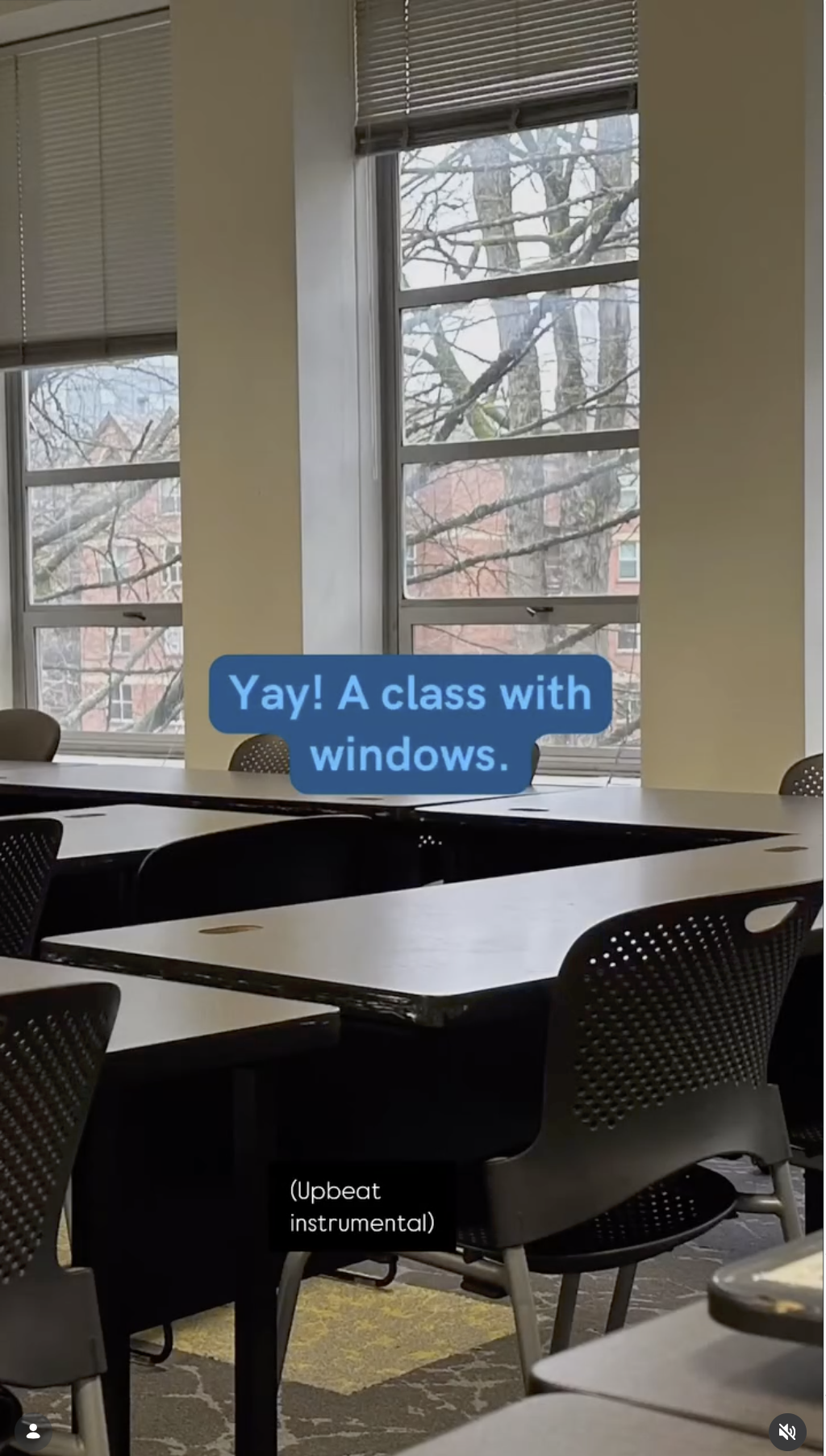 text over empty classroom that reads Yay! A class iwth windows