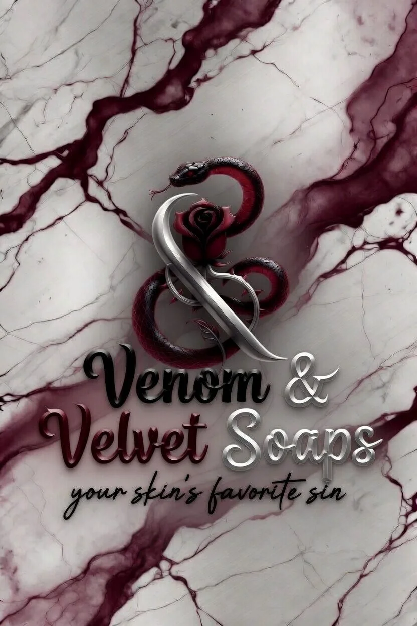 A tattoo design featuring a red and black snake intertwined with a black rose and the text 'Venom & Velvet Soaps' with the slogan 'your skin's favorite sin' on a white marble background with red veins.
