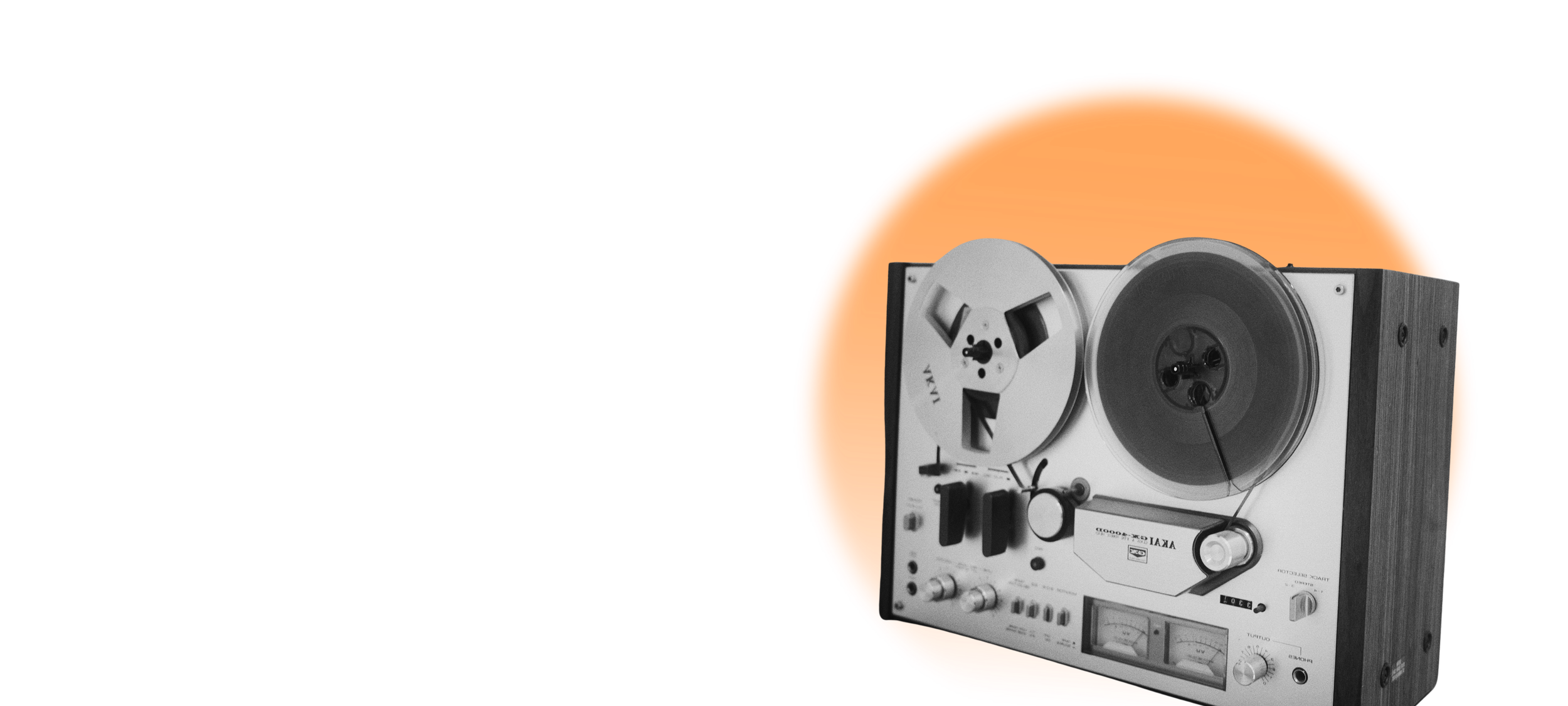 Vintage reel-to-reel tape recorder against a yellow background with a glowing orange circle.