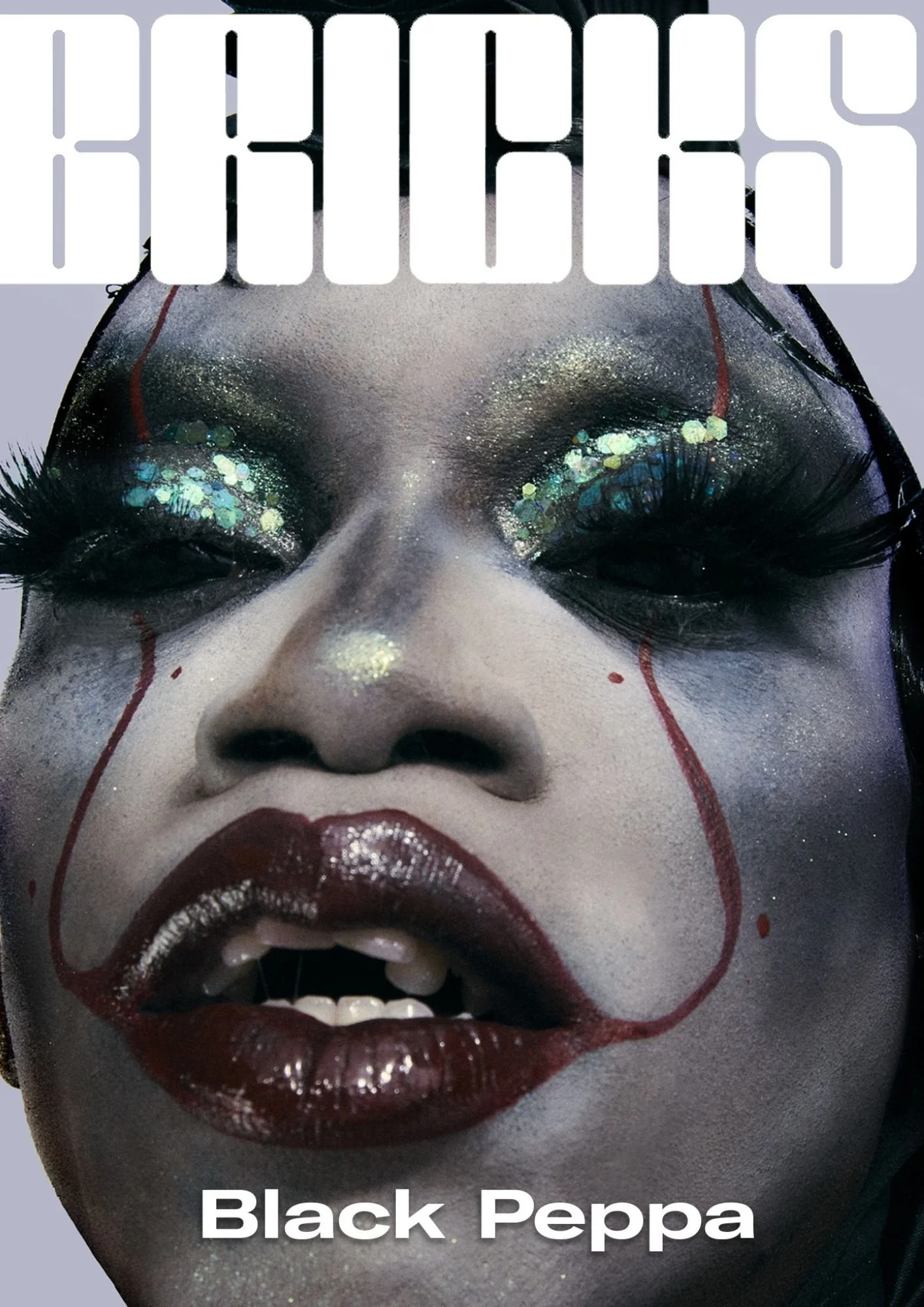 Close-up of a person with makeup and glitter on their face, dark lipstick, and artwork resembling a clown or mime. The person has makeup designs on the lips, nose, and red lines on the face. The eyes are closed and decorated with shiny, colorful glit
