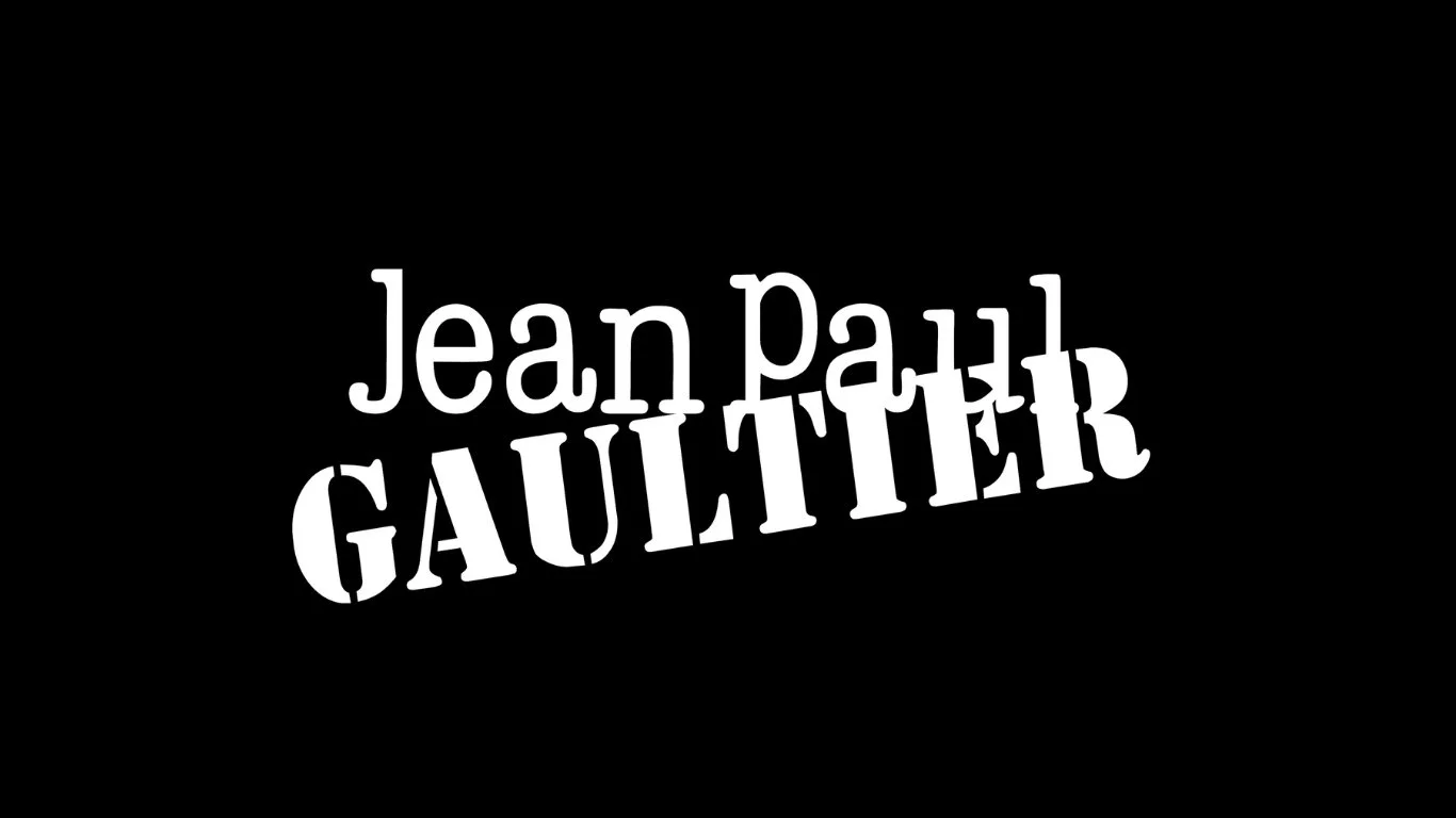 Text reading 'Jean Paul Gaultier' in stylized white font on a black background