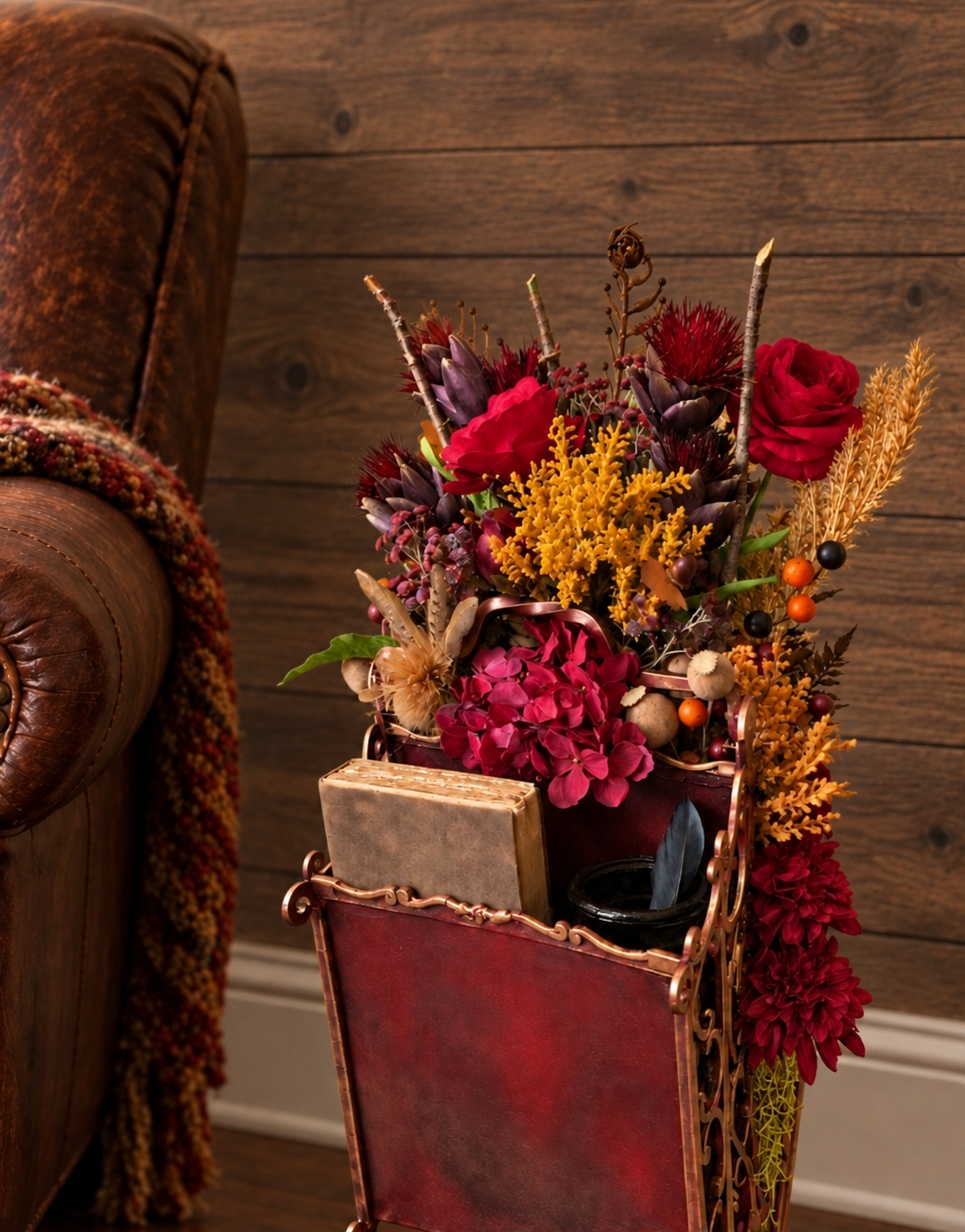 SOLD - The Crimson Scribe

A vintage magazine rack reborn as an ornate journal and pen holder. Distressed and finished with Annie Sloan Black Wax and gold gilding, it holds an aged journal and feather pen beneath a lavish gathering of Victorian autum
