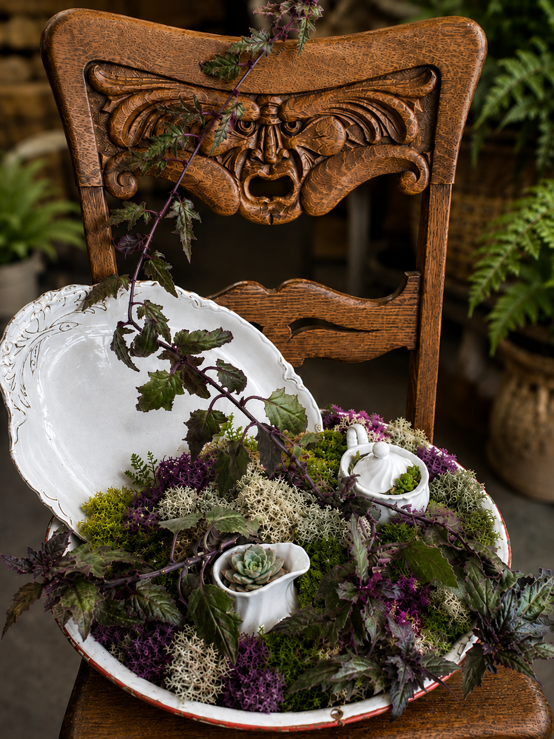 SOLD — The Green Man Chair

One of a handcrafted pair of Green Man art chairs, featuring an extraordinary carved woodland face emerging from the vintage woodwork. Rich with character and old-world detail, each chair had its own personality while shar