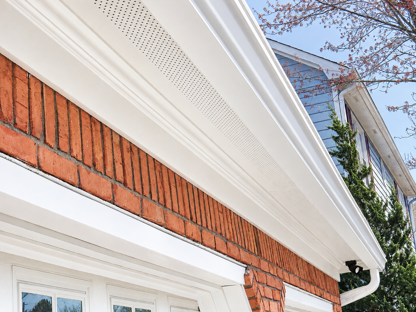 Hardie soffit installed beneath roof eaves for a finished exterior appearance.