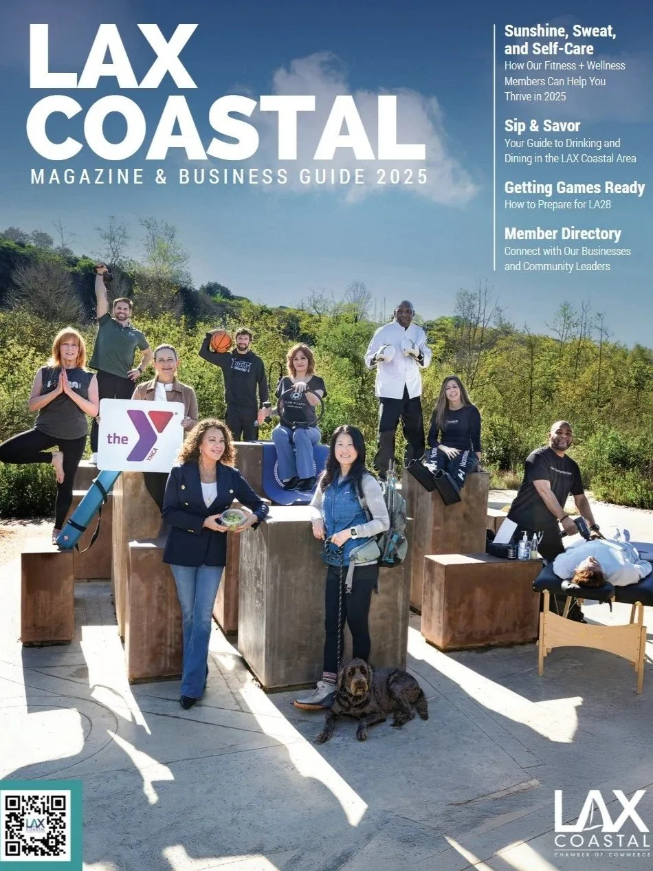 Photo of diverse group of people outdoors on a sunny day, engaging in various activities like yoga, sports, and wellness, with greenery and blue sky in the background, on the cover of LAX Coastal Magazine & Business Guide 2025.
