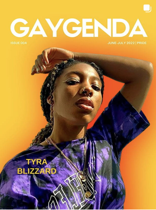Cover of GayGenda magazine featuring Tyra Blizzard with a yellow and orange background. Tyra Blizzard has braids, jewelry, and is wearing a purple tie-dye shirt.