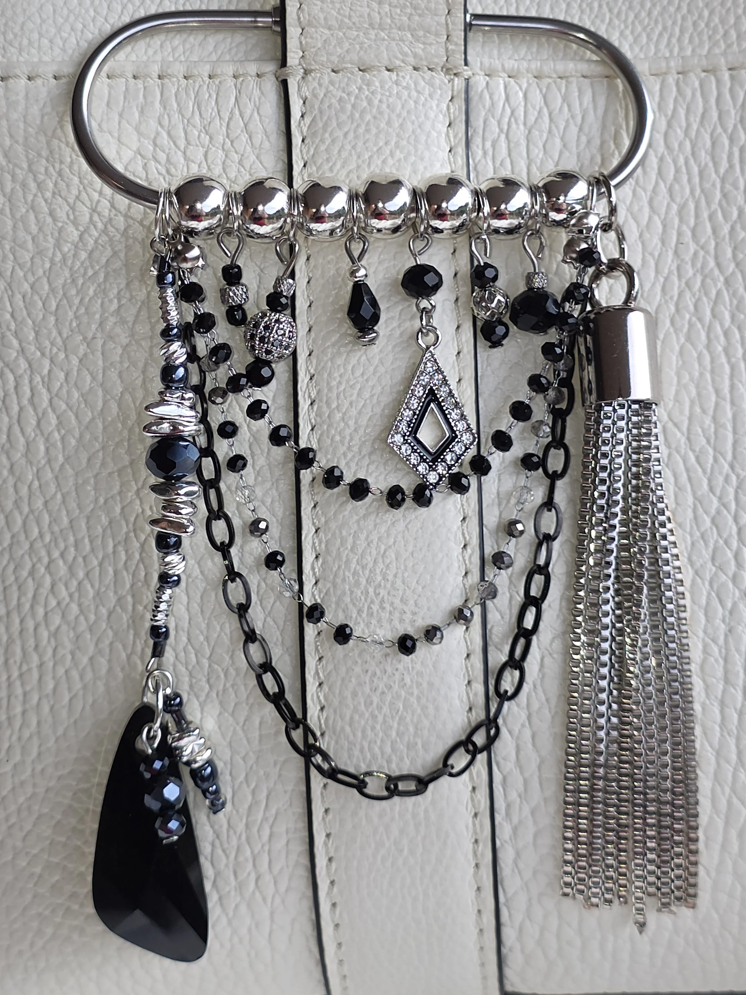 Black and silver handmade bag charm with Swarovski crystal and silver toned tassel — The Ruth by Charm & Delight